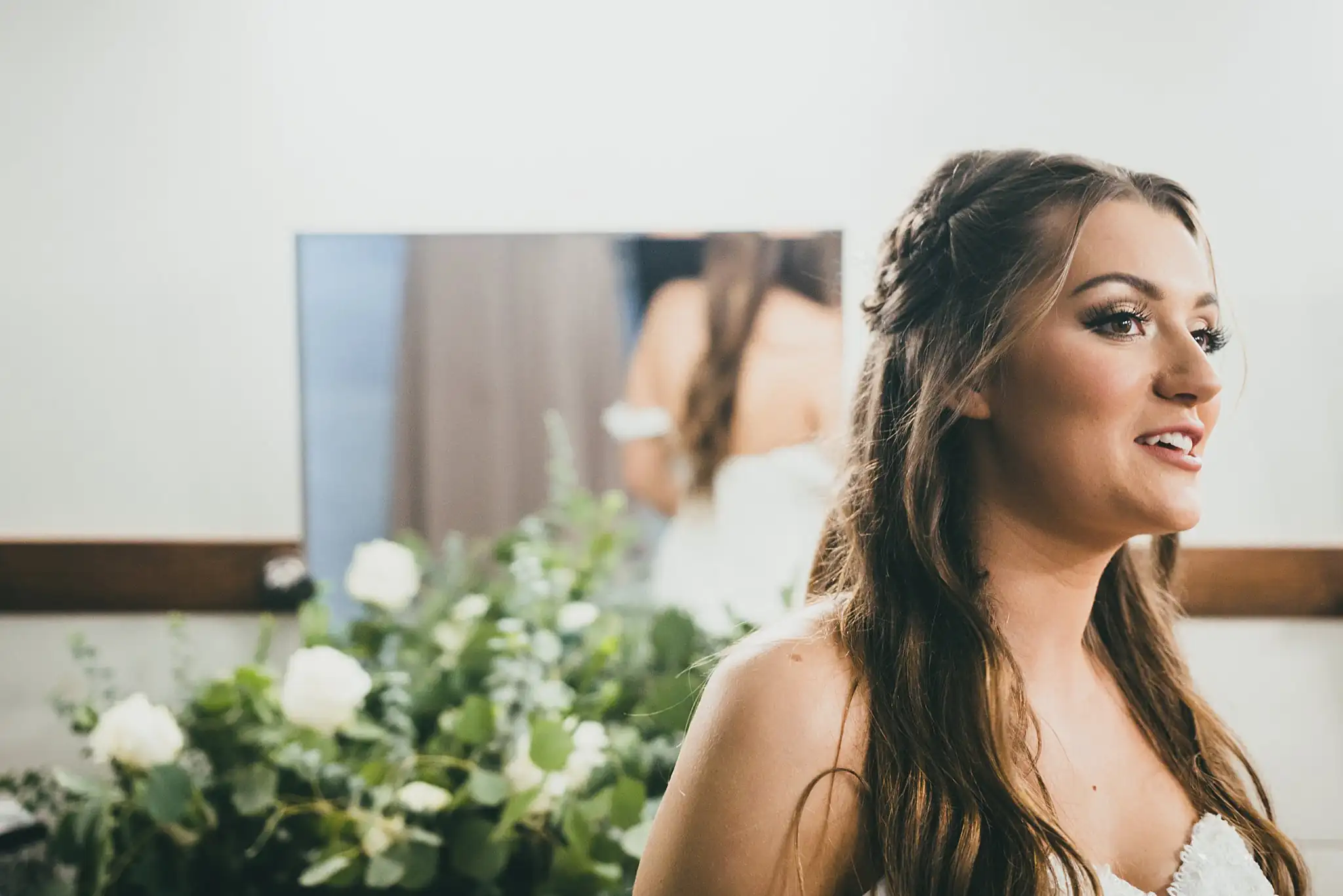 Barn at Harper Pines Wedding Thomaston, GA Atlanta Wedding Photographers Getting Ready: the bride smiling beside her bouquet, before their wedding at the Barn at Harper Pines in Thomaston, GA