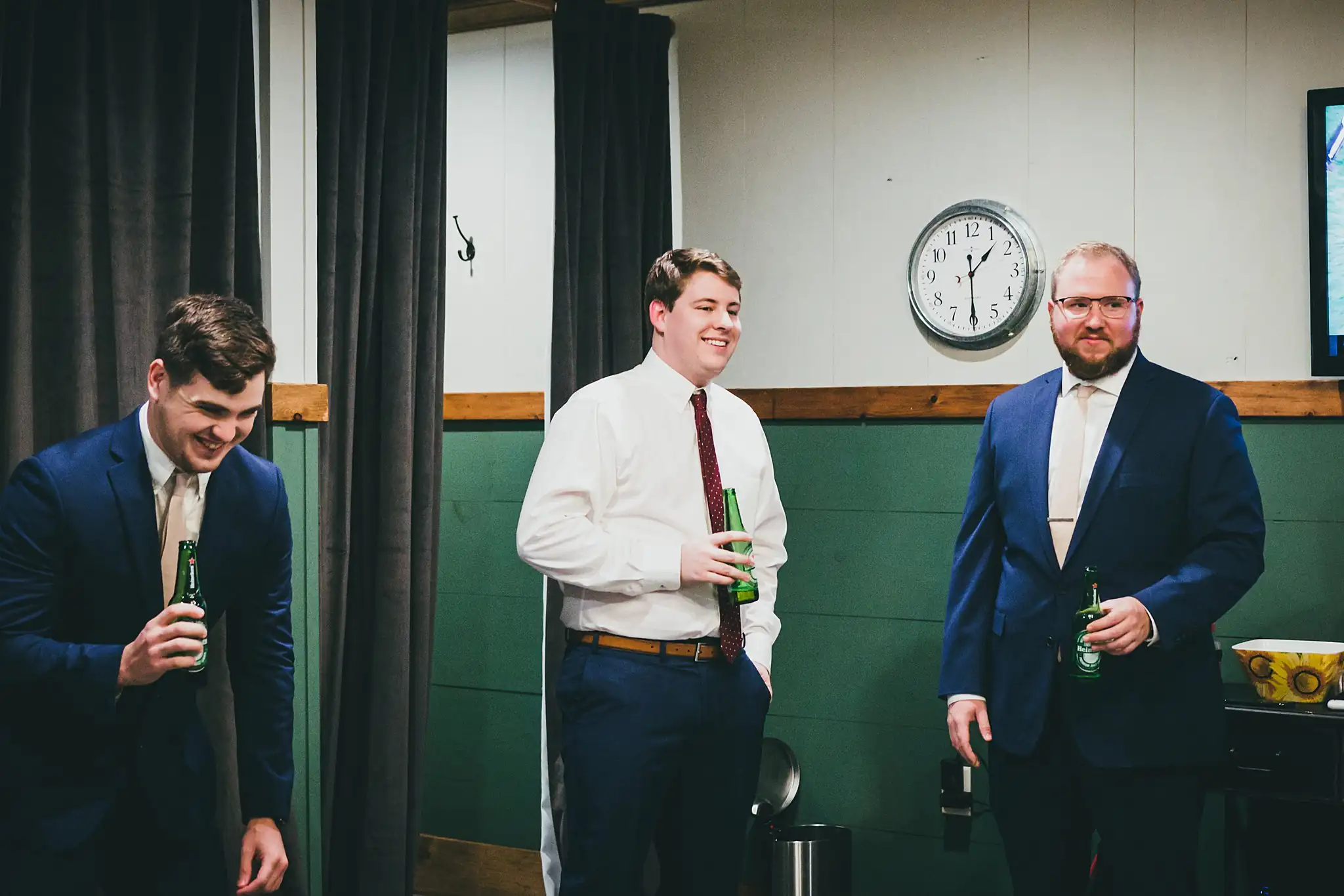 Barn at Harper Pines Wedding Thomaston, GA Atlanta Wedding Photographers Getting Ready: the groom and his groomsmen with drinks, before their wedding at the Barn at Harper Pines in Thomaston, GA