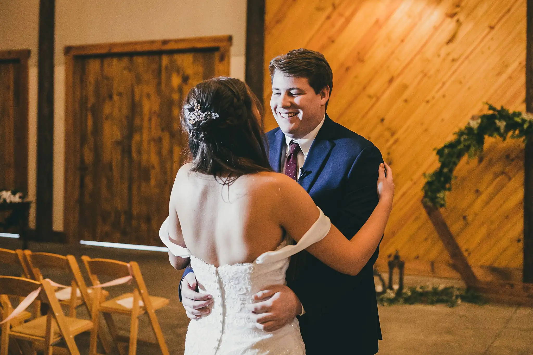 Barn at Harper Pines Wedding Thomaston, GA Atlanta Wedding Photographers First Look: the couple embracing after their first look, before their wedding at the Barn at Harper Pines in Thomaston, GA