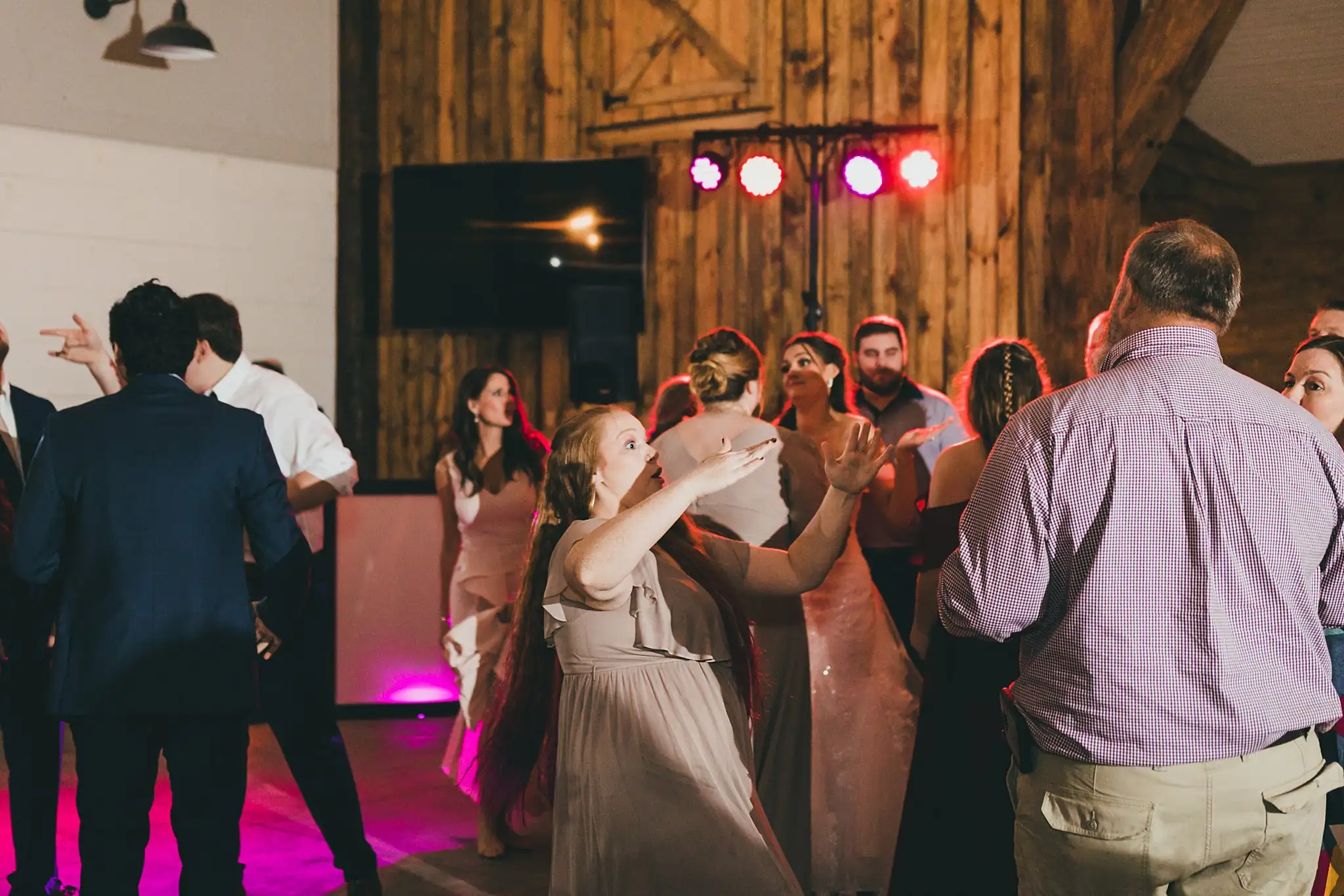 Barn at Harper Pines Wedding Thomaston, GA Atlanta Wedding Photographers Wedding Reception: the dance floor filling up, at their wedding at the Barn at Harper Pines in Thomaston, GA