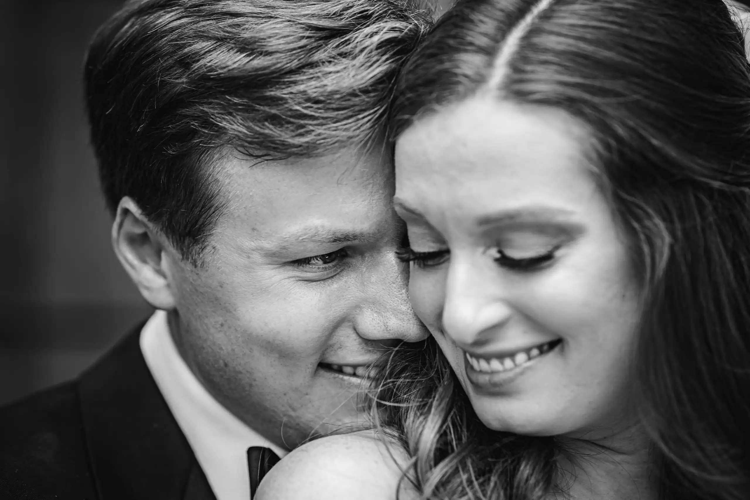 Wedding Formals: the couple close together in black and white, at their wedding at Summerour Studio in Atlanta, GA