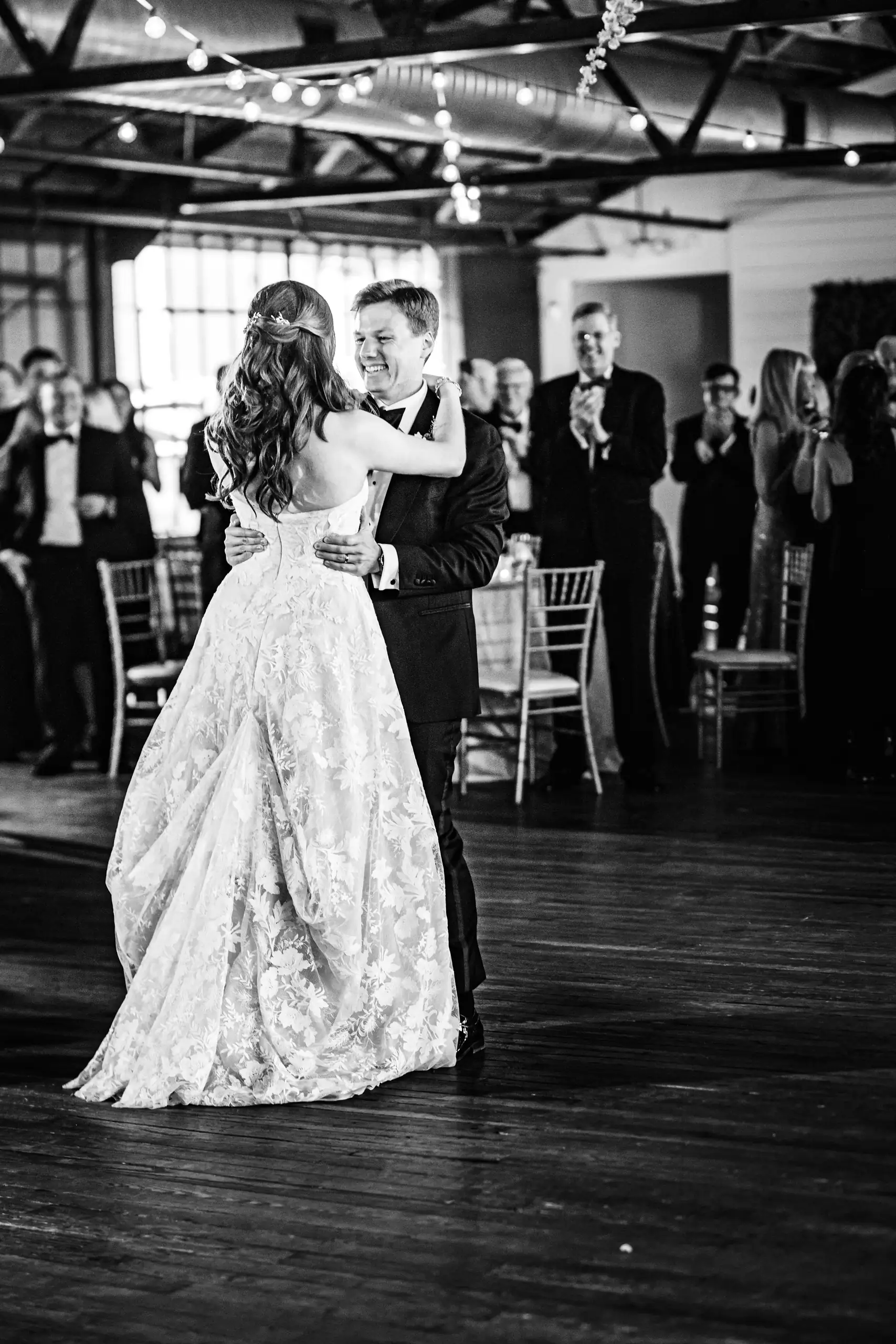 Parent Dance: the bride dancing with her father, in black and white, at their wedding at Summerour Studio in Atlanta, GA
