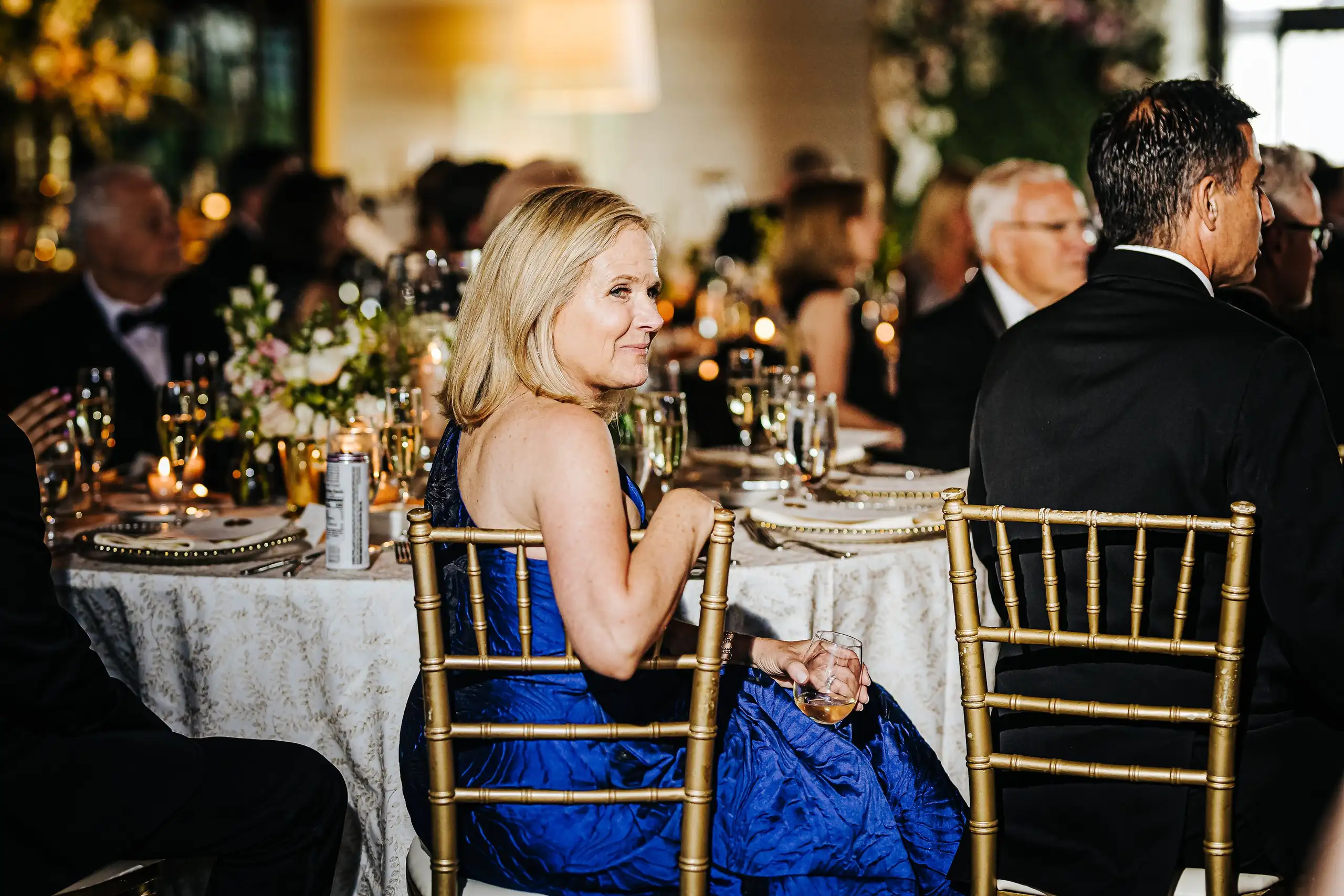 Wedding Reception: guests at their table, at their wedding at Summerour Studio in Atlanta, GA