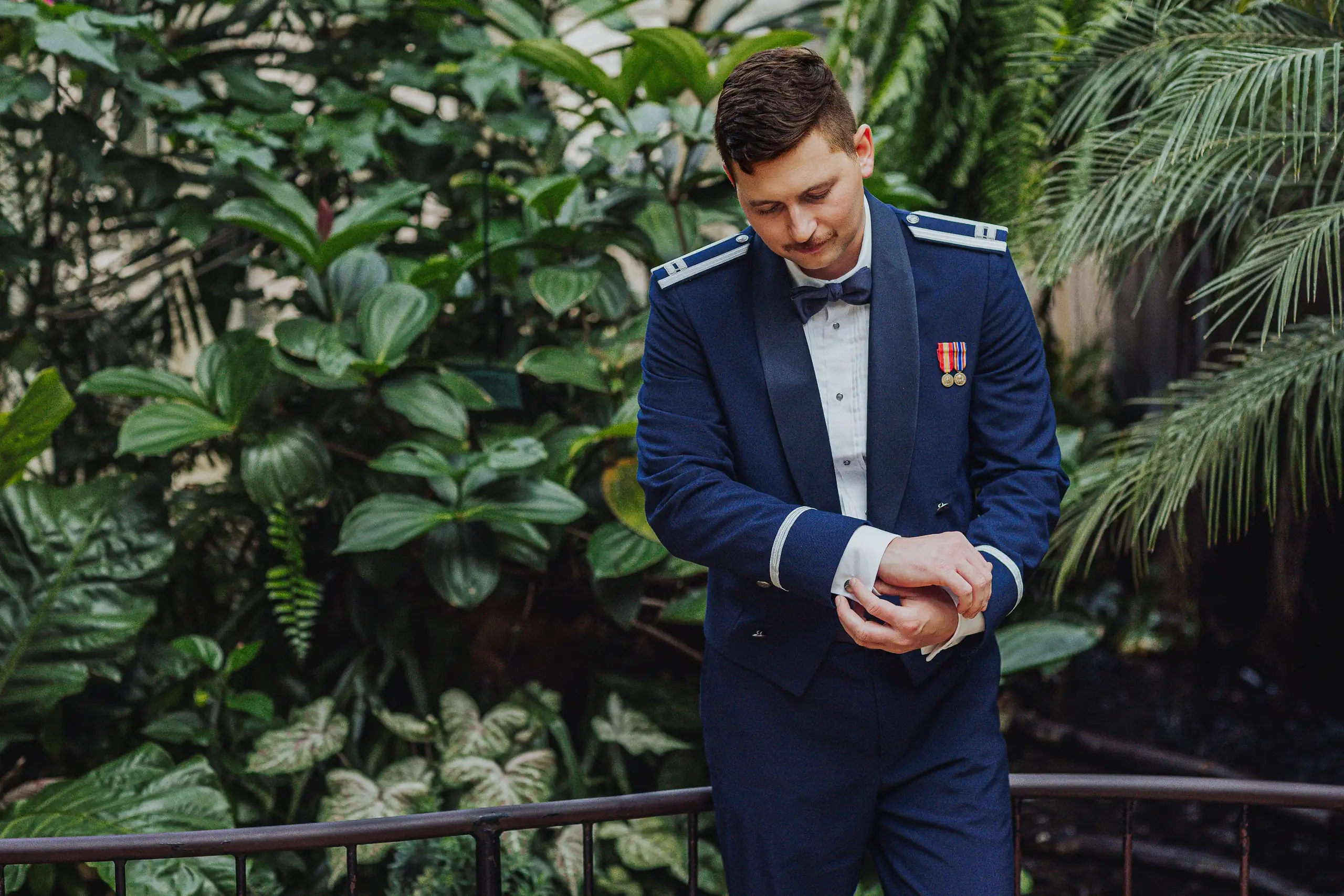 Wedding Formals: the groom in his dress uniform among the glasshouse plants, at their wedding at Callaway Gardens in Pine Mountain, GA