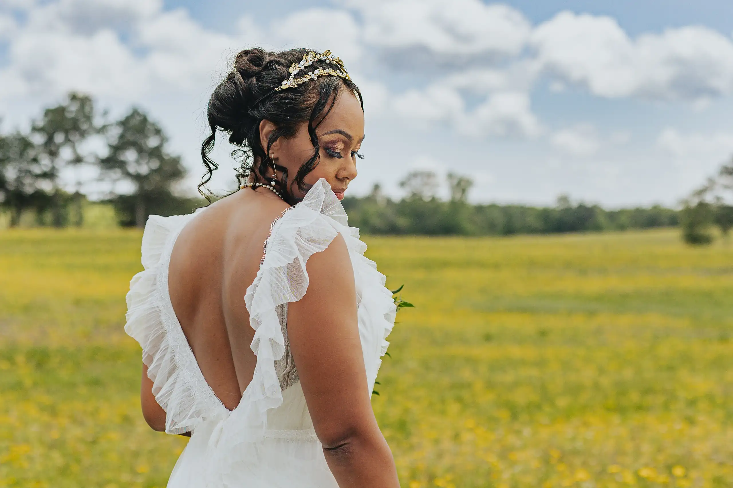 Bridal Portraits: the bride in her ruffled gown in the yellow field, at their wedding at Callaway Gardens in Pine Mountain, GA