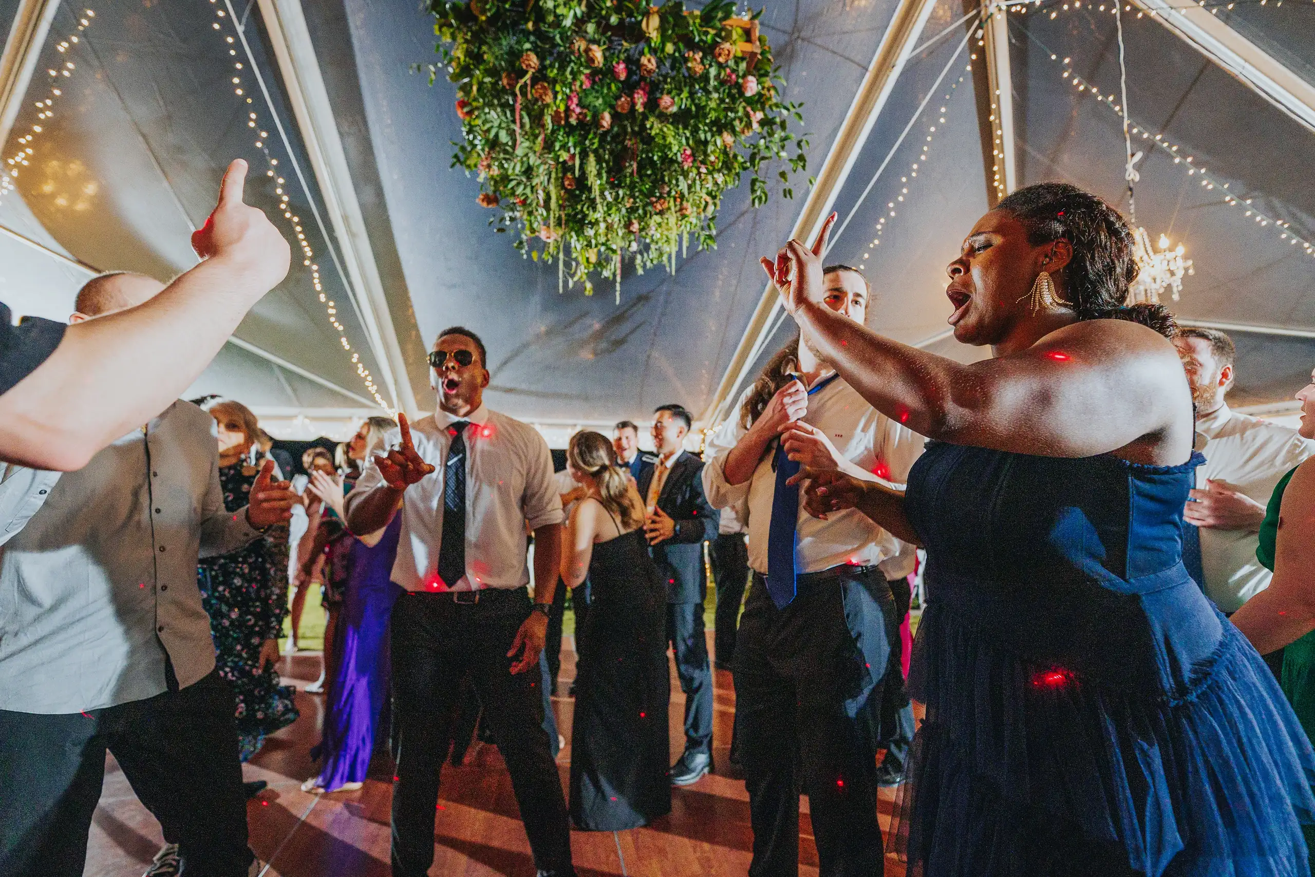 Wedding Reception: the dance floor filling up under the tent lights, at their wedding at Callaway Gardens in Pine Mountain, GA