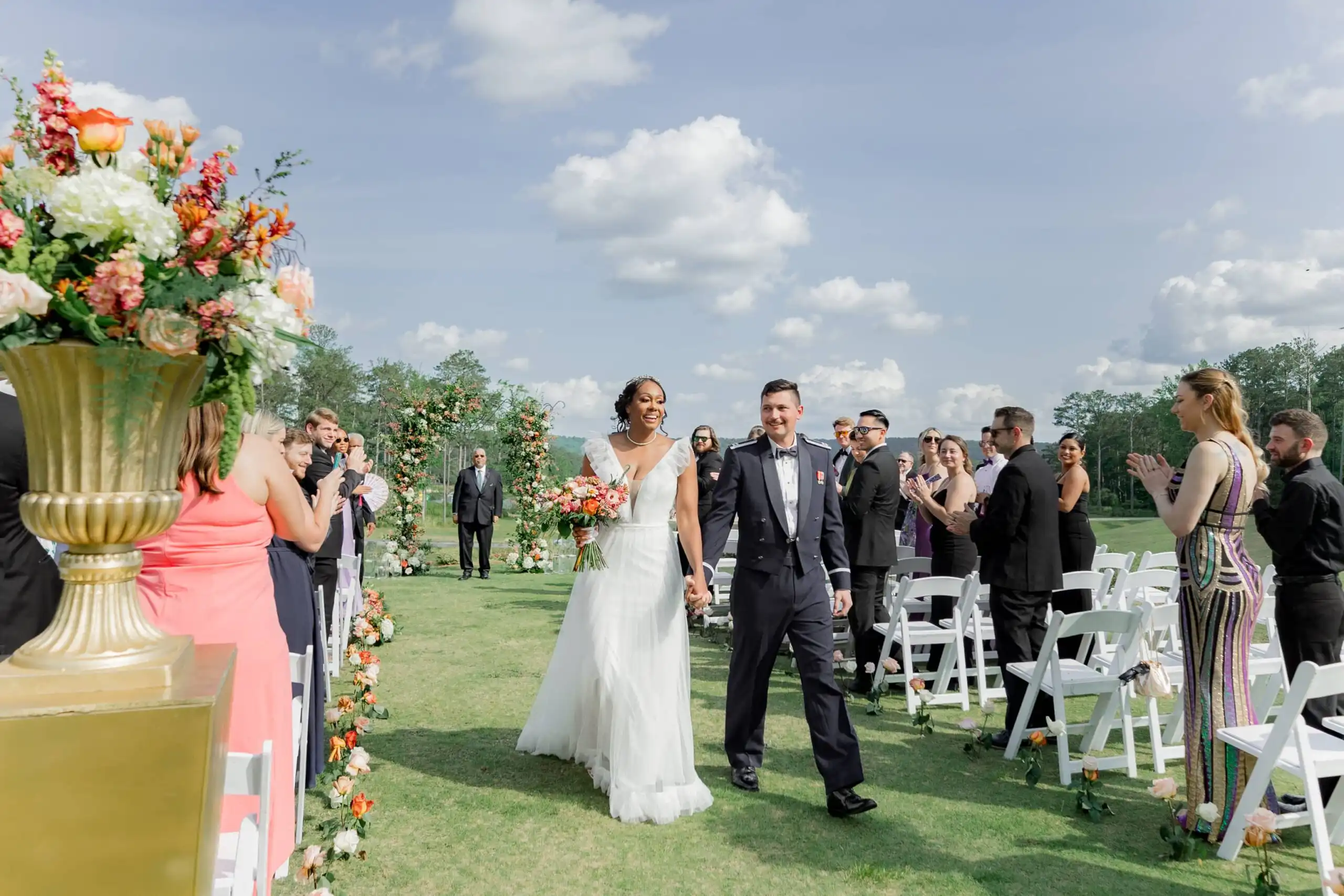 Bride and groom walking back down the aisle at their wedding ceremony at Callaway Gardens in Pine Mountain, GA