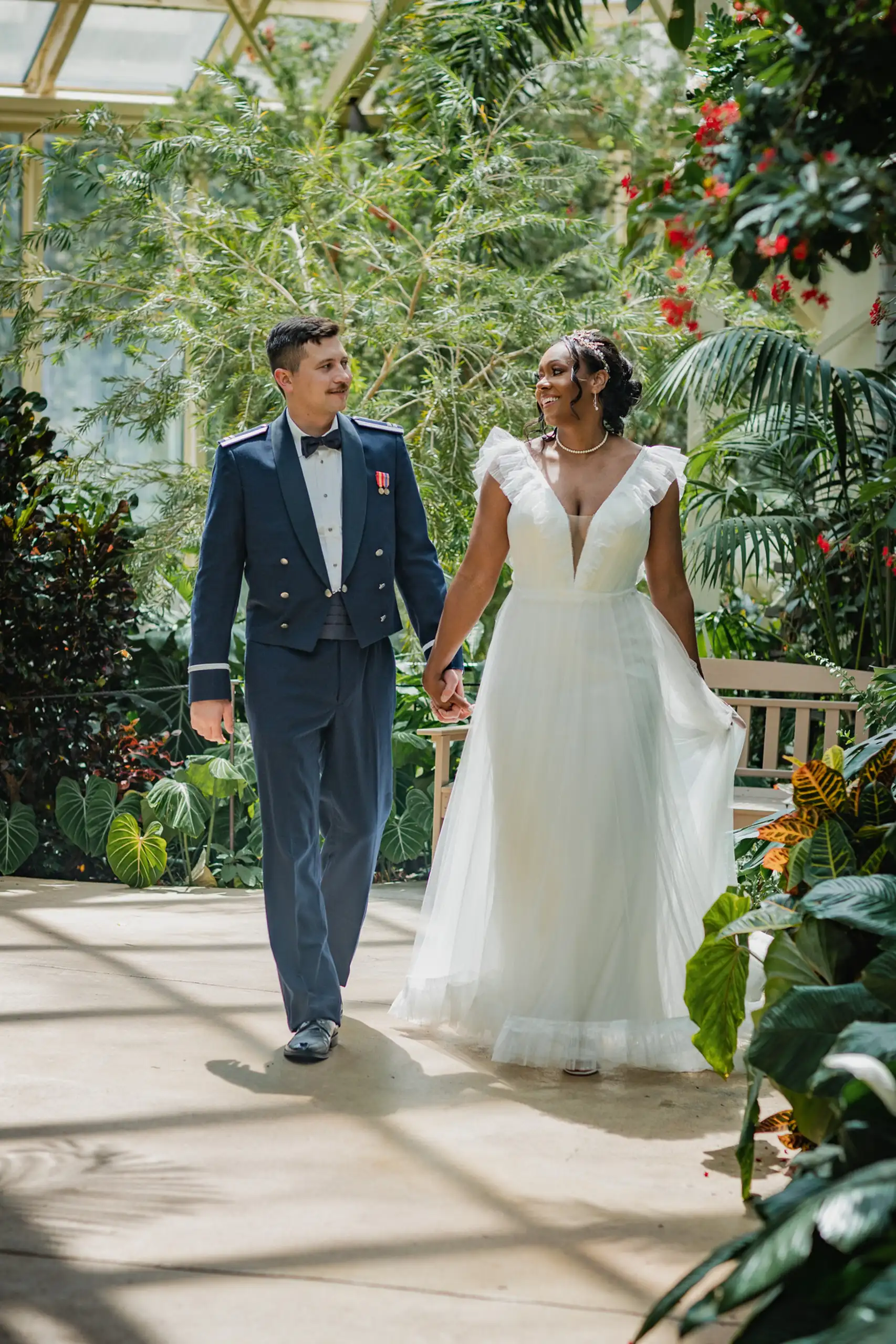 Wedding Formals: the couple among the glasshouse planting, at their wedding at Callaway Gardens in Pine Mountain, GA