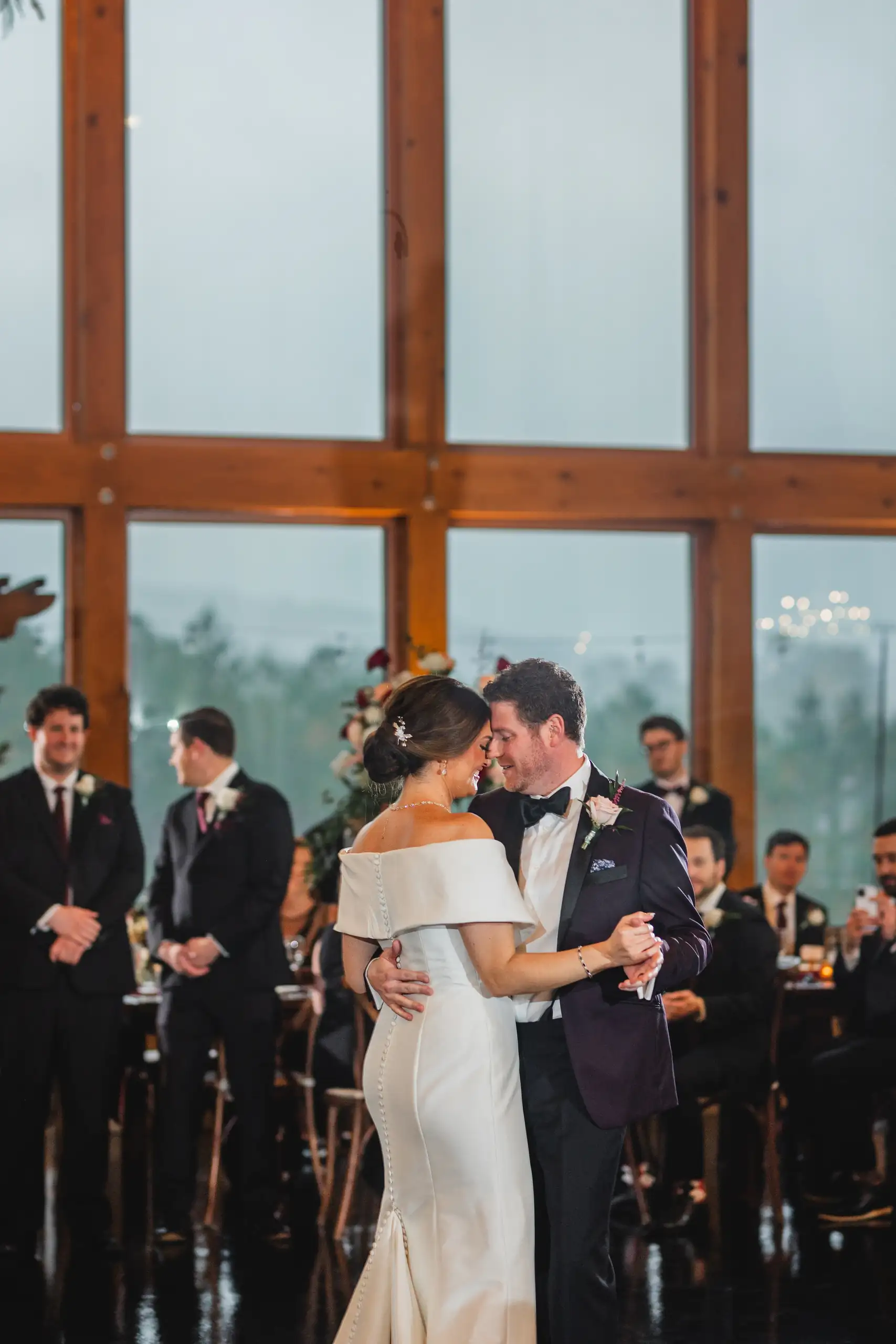 First Dance: their first dance in front of the tall windows, at their wedding at The Venue at Sharp Mountain in Jasper, GA