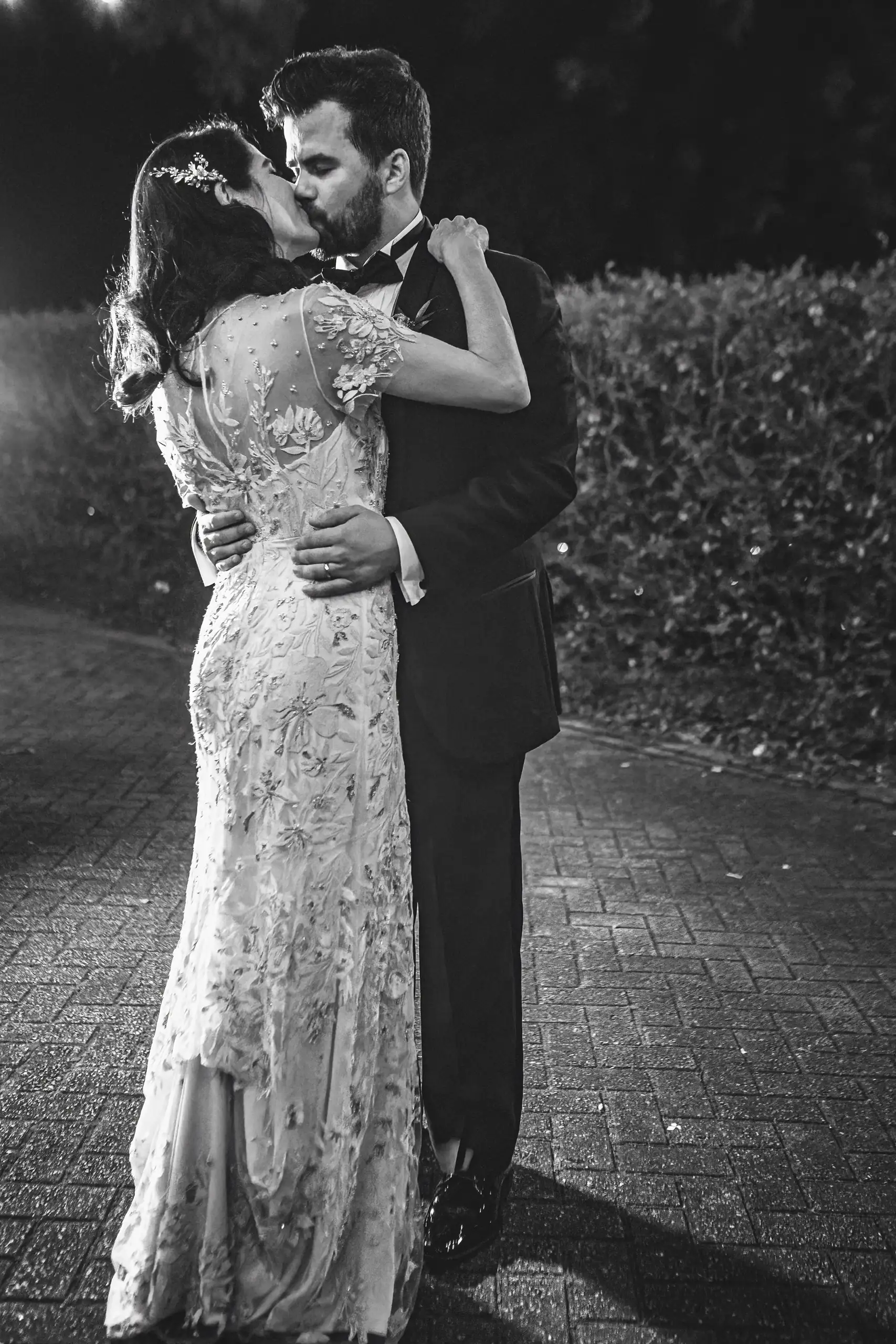 Wedding Formals: the two of them close on the terrace, in black and white, at their wedding at the Trolley Barn in Atlanta, GA