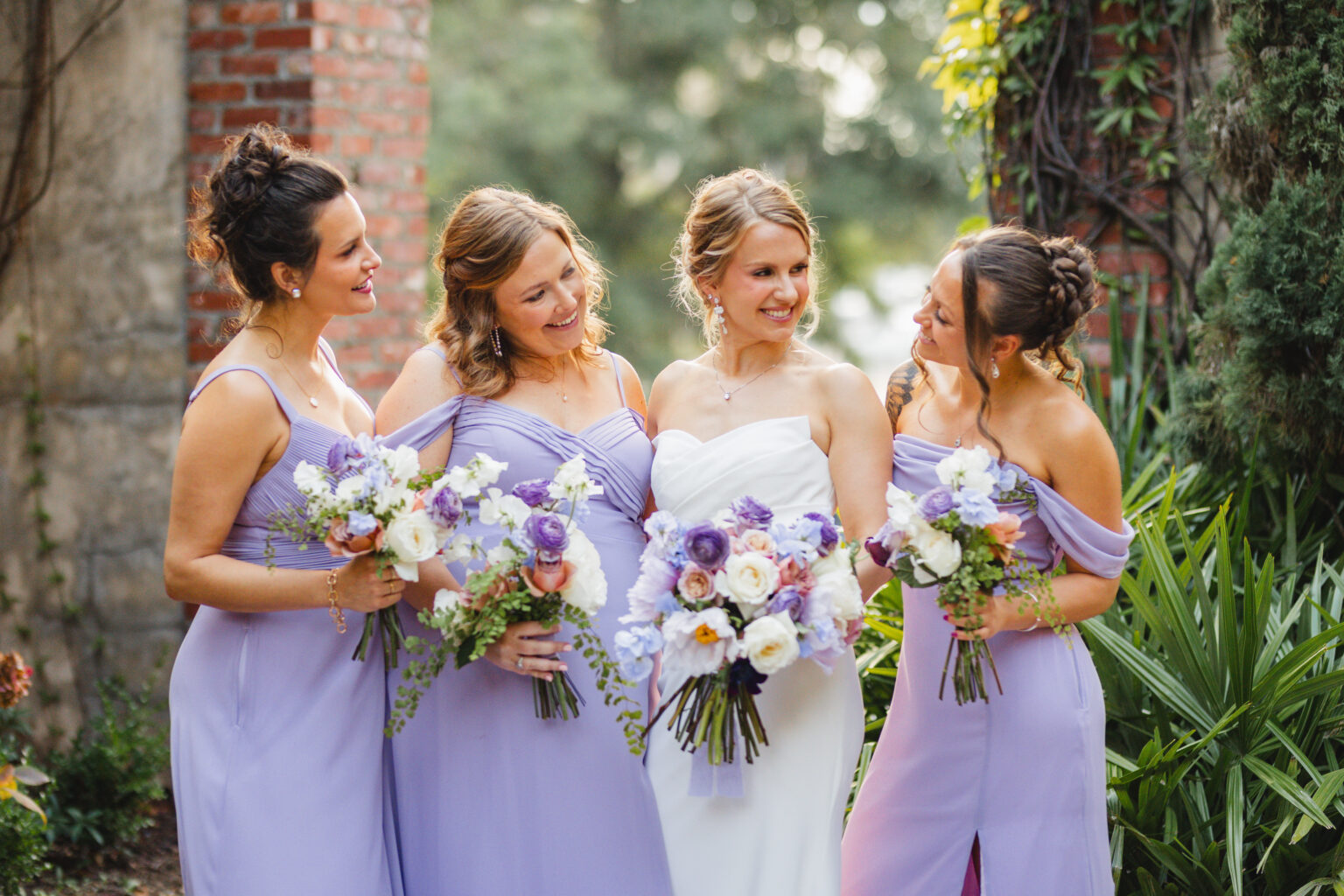 Bride and her bridesmaids with bouquets at a Summerour Studio wedding, Atlanta