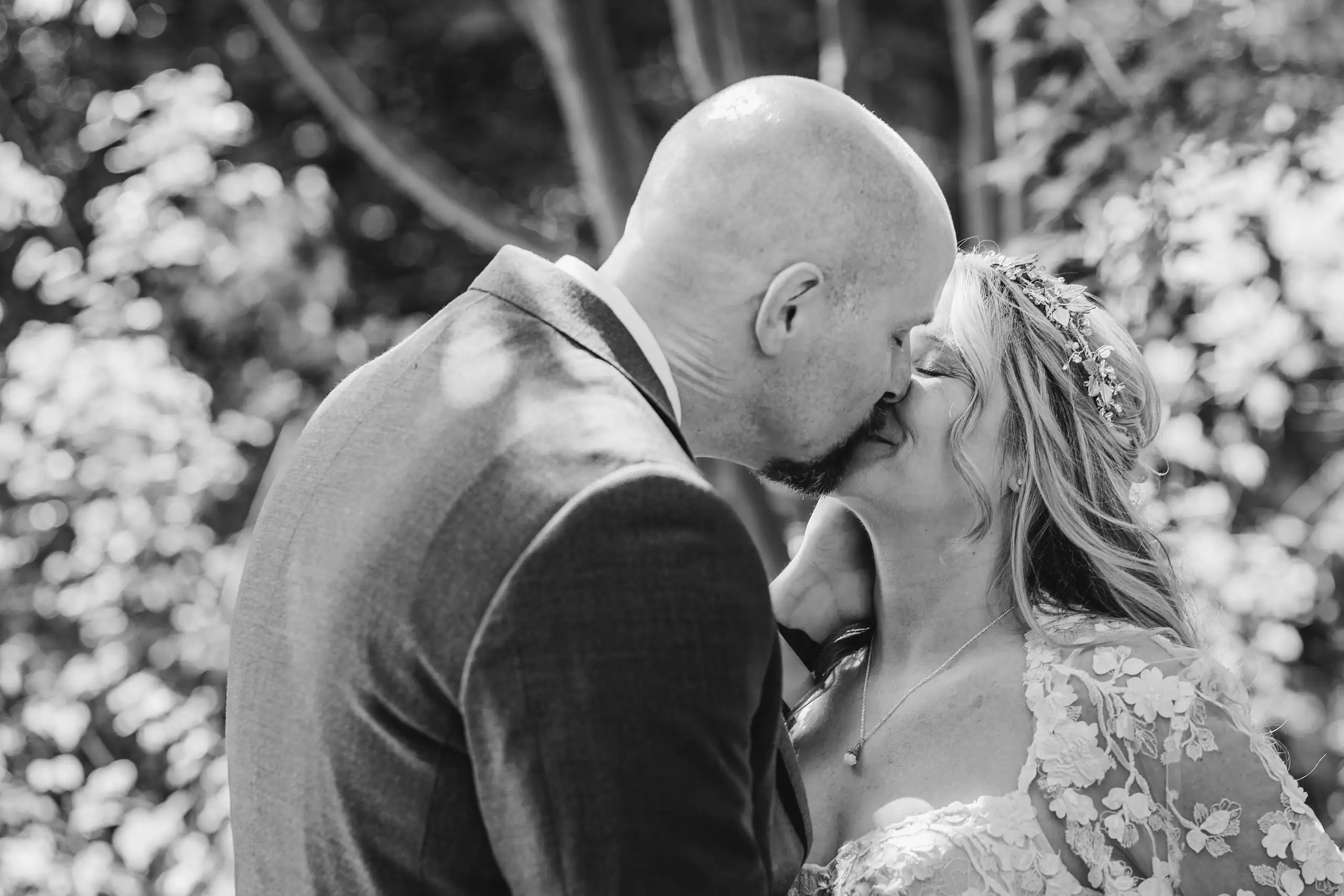 Wedding Formals: the couple about to kiss, in black and white, at their wedding at Callanwolde Fine Arts Center in Atlanta, GA