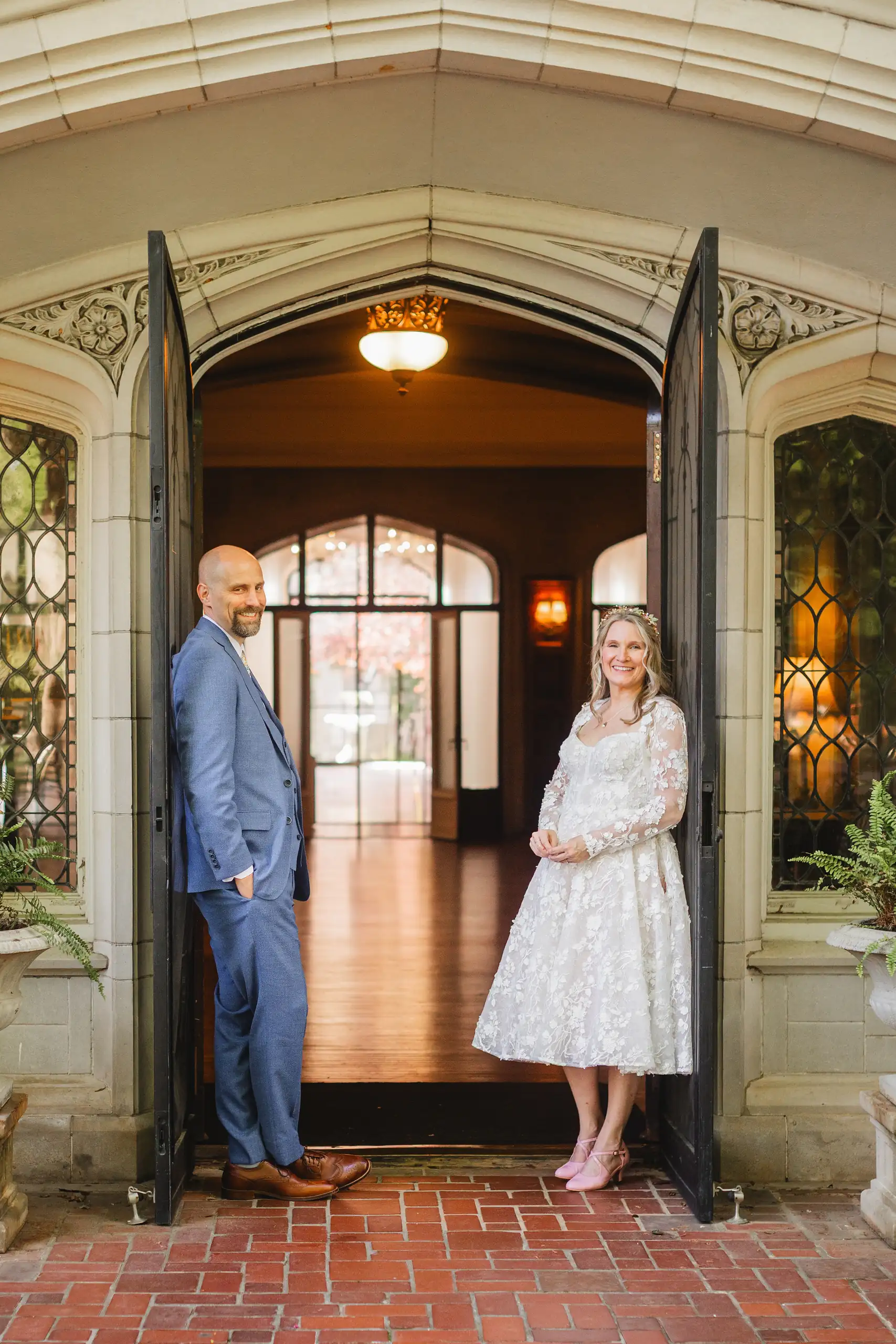 Wedding Formals: the couple framed in the arched doorway, at their wedding at Callanwolde Fine Arts Center in Atlanta, GA