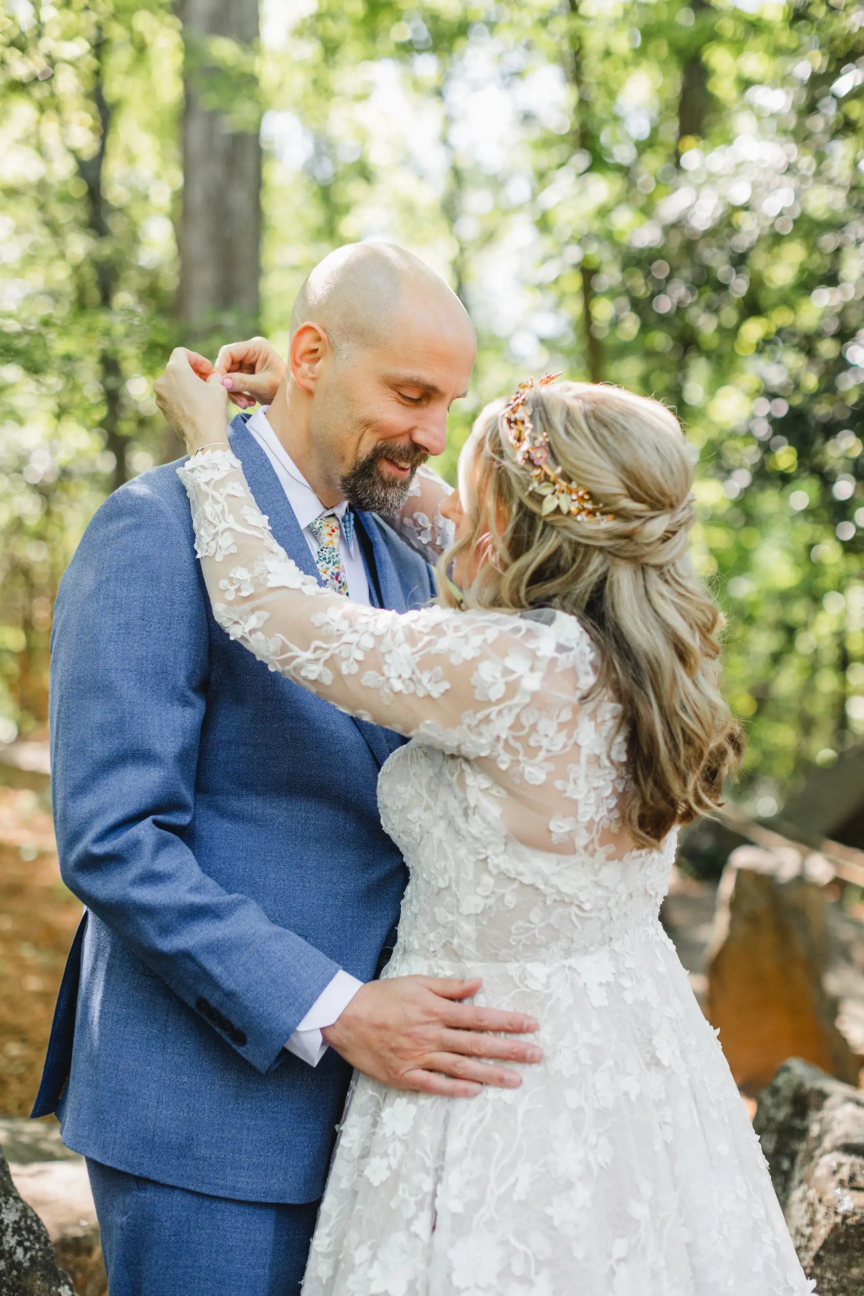 Wedding Formals: the couple embracing, both laughing, at their wedding at Callanwolde Fine Arts Center in Atlanta, GA