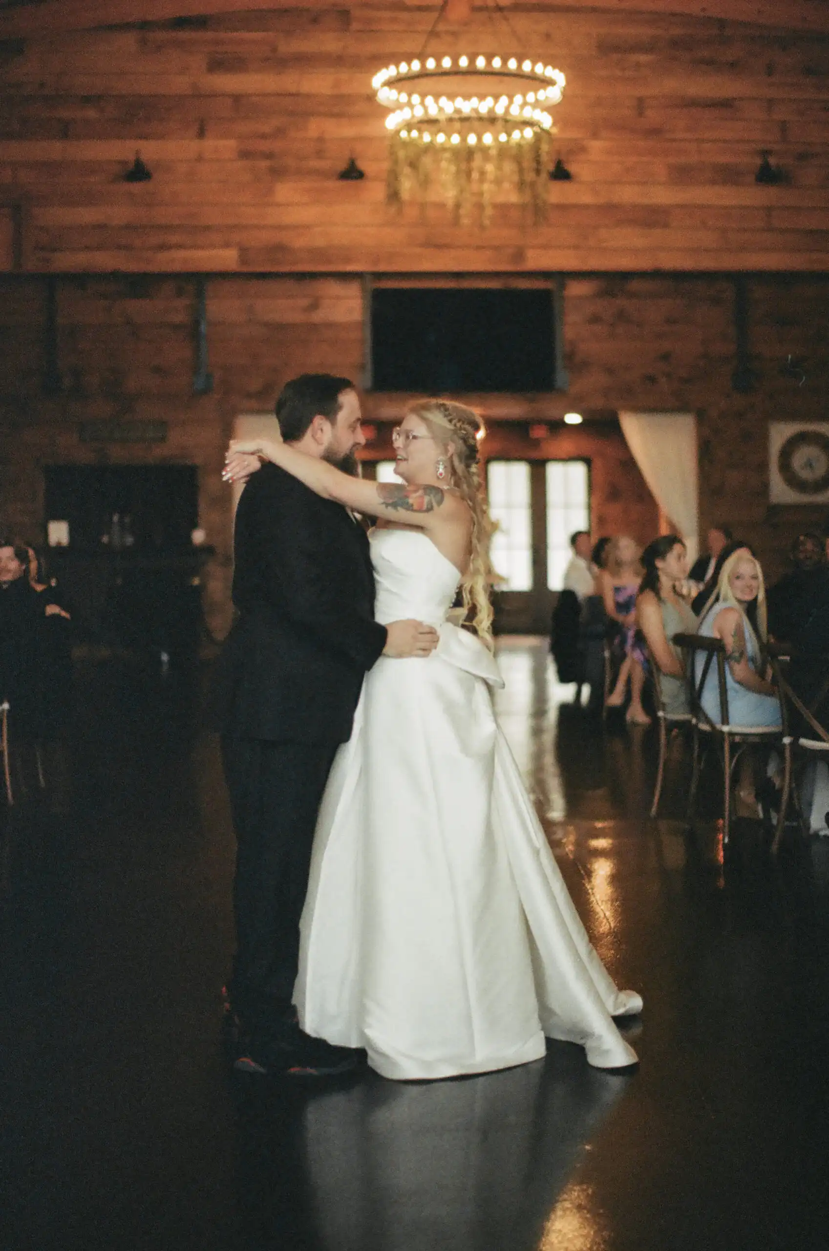 Bride and groom's first dance at their wedding reception, shot on 35mm film at The Venue at Sharp Mountain in North Georgia