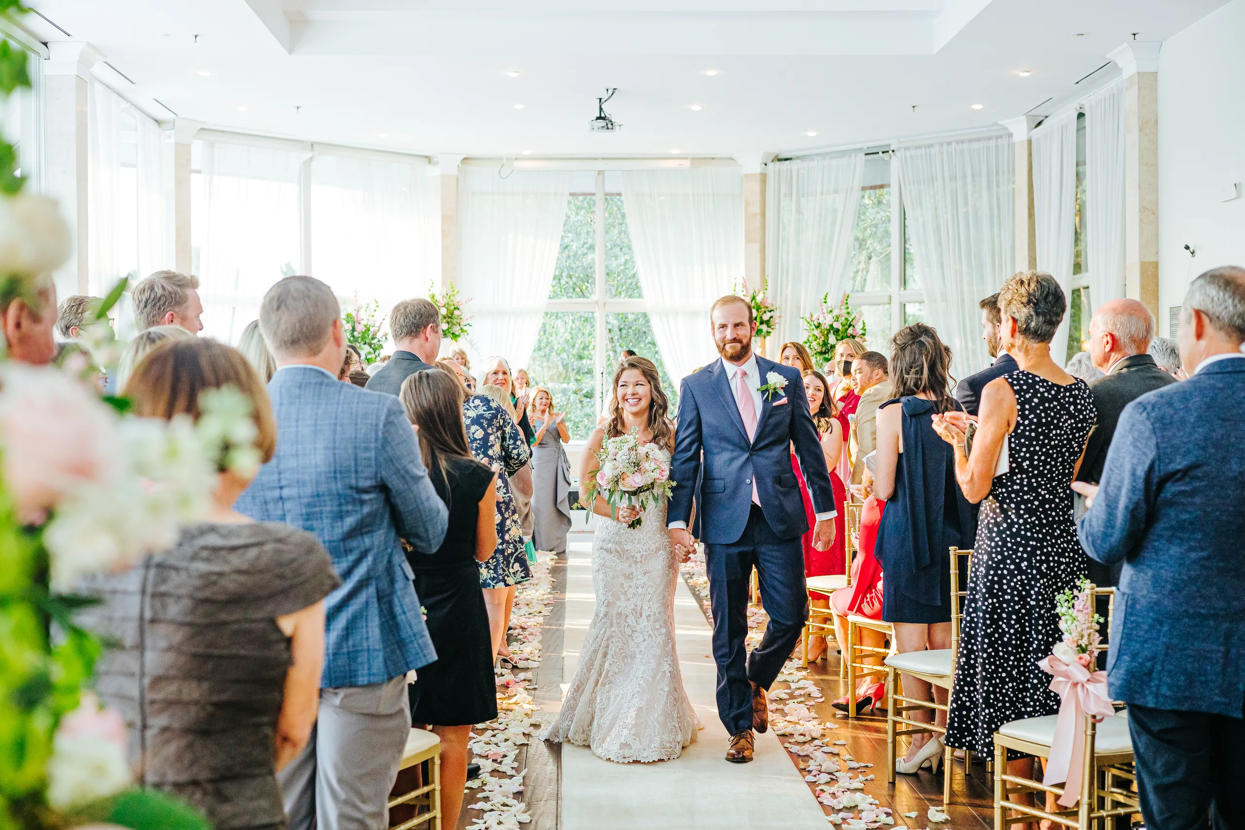 Wedding Ceremony: walking back up the aisle together, at their wedding at The Piedmont Room in Atlanta, GA