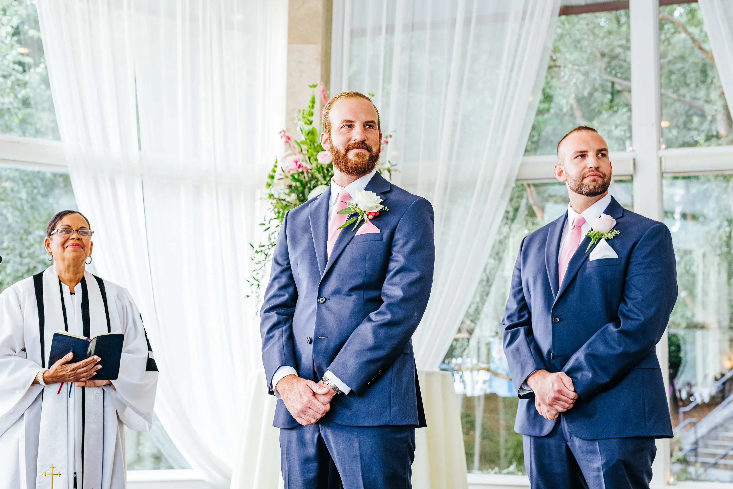 Wedding Ceremony: the groom and his best man at the front, at their wedding at The Piedmont Room in Atlanta, GA