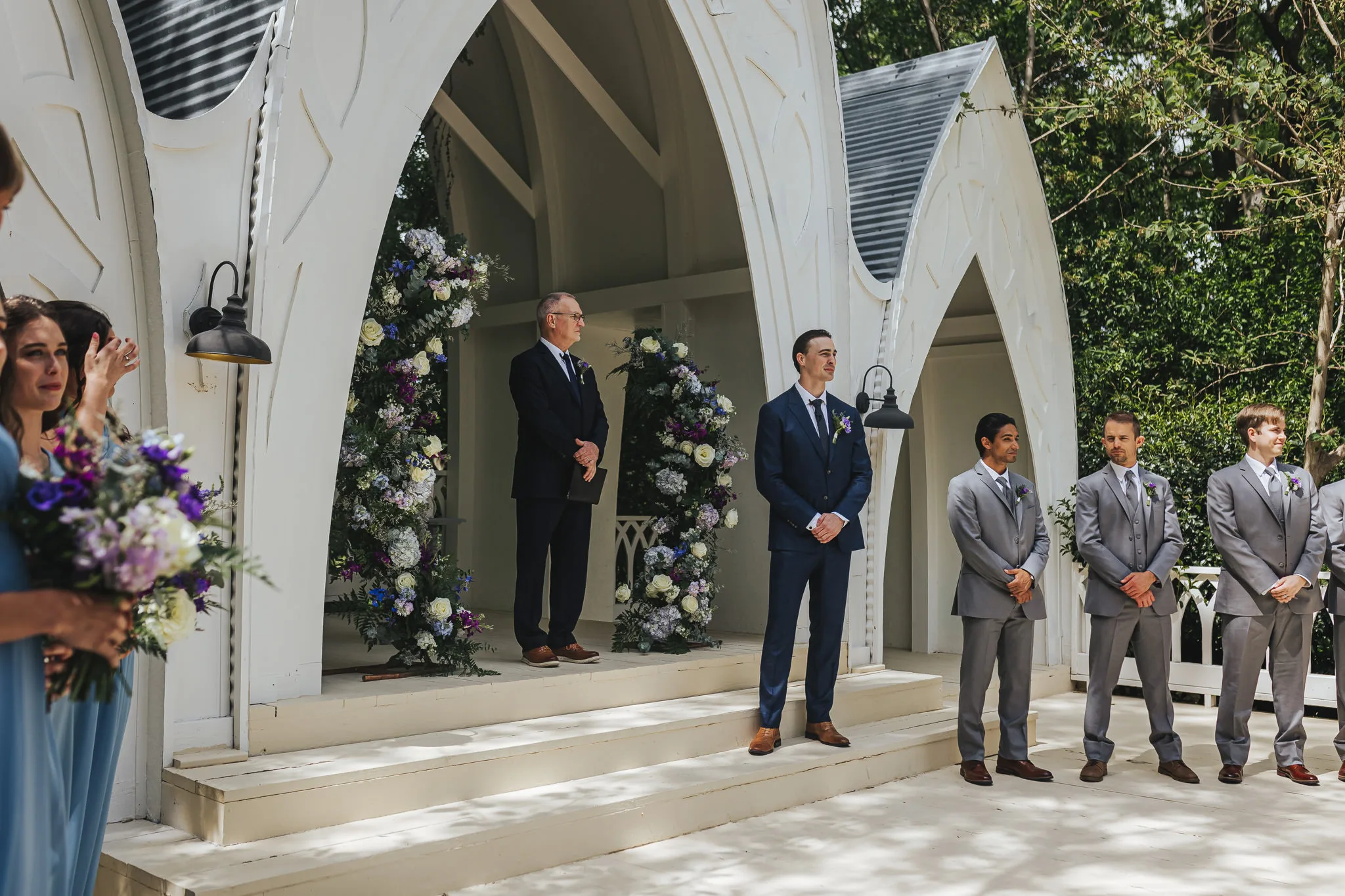 Wedding Ceremony: the groom and his groomsmen waiting at the chapel, at their wedding at The Wildflower 301 in Greensboro, GA