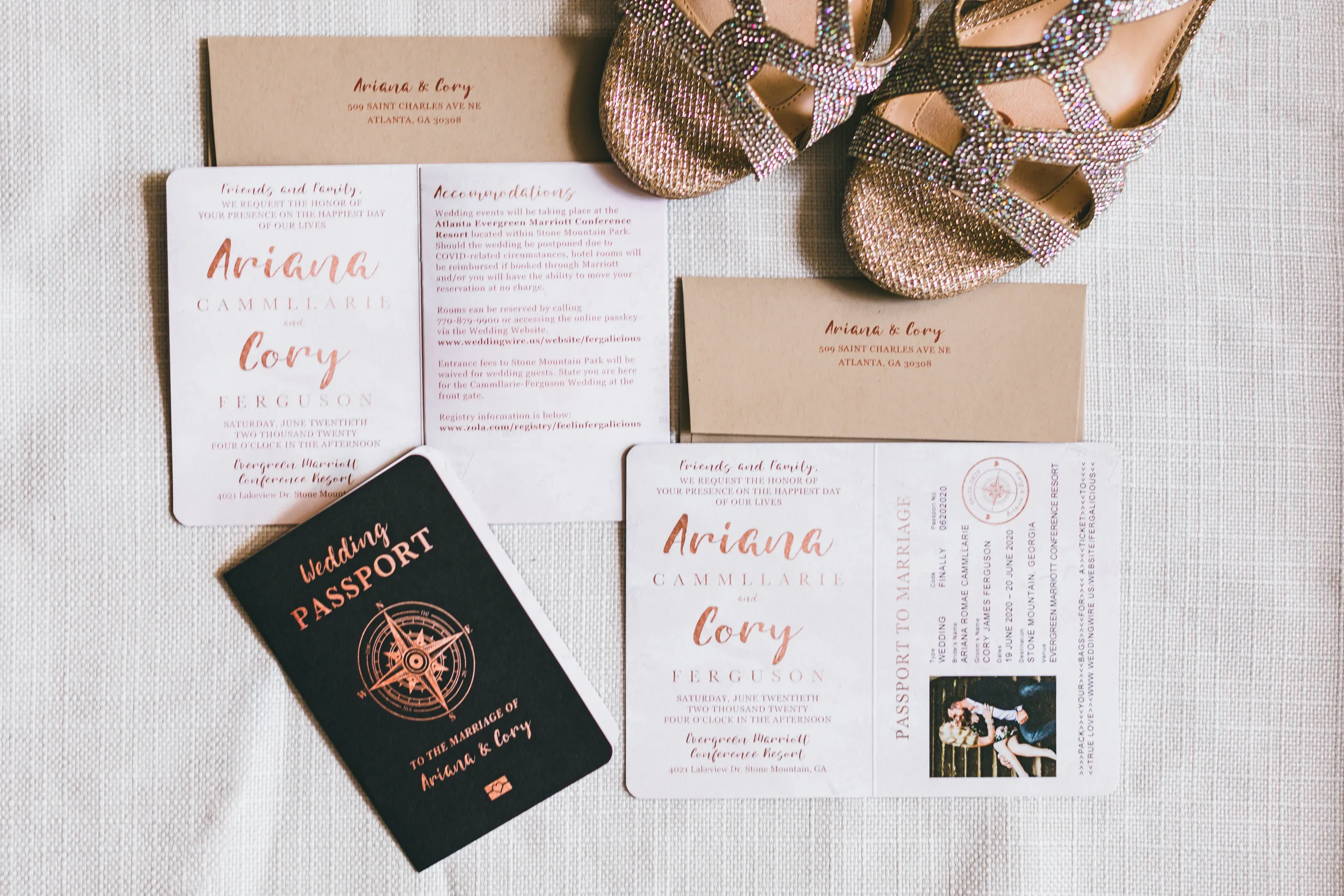 Wedding Details: their passport style invitations with a Wedding Passport booklet, at a wedding at Atlanta Evergreen Lakeside Resort in Stone Mountain, GA