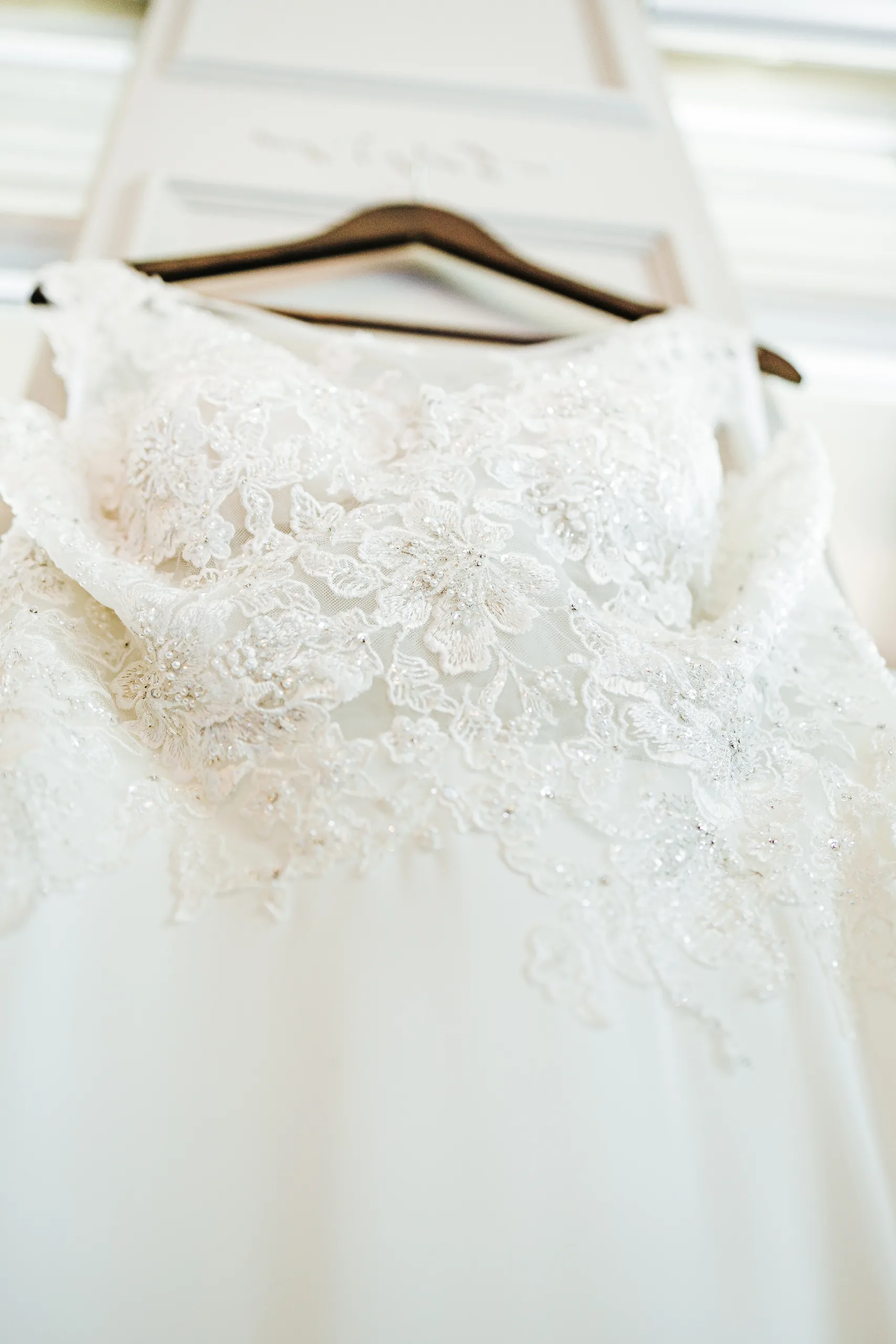 Wedding Details: the lace bodice of her gown at a wedding at the Country Club of Roswell in Roswell, GA
