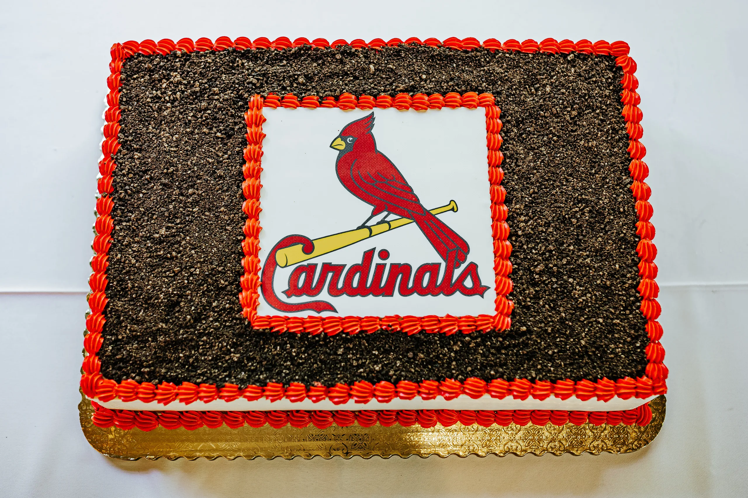 Wedding Cake Details: the St. Louis Cardinals groom's cake at a wedding at the Country Club of Roswell in Roswell, GA