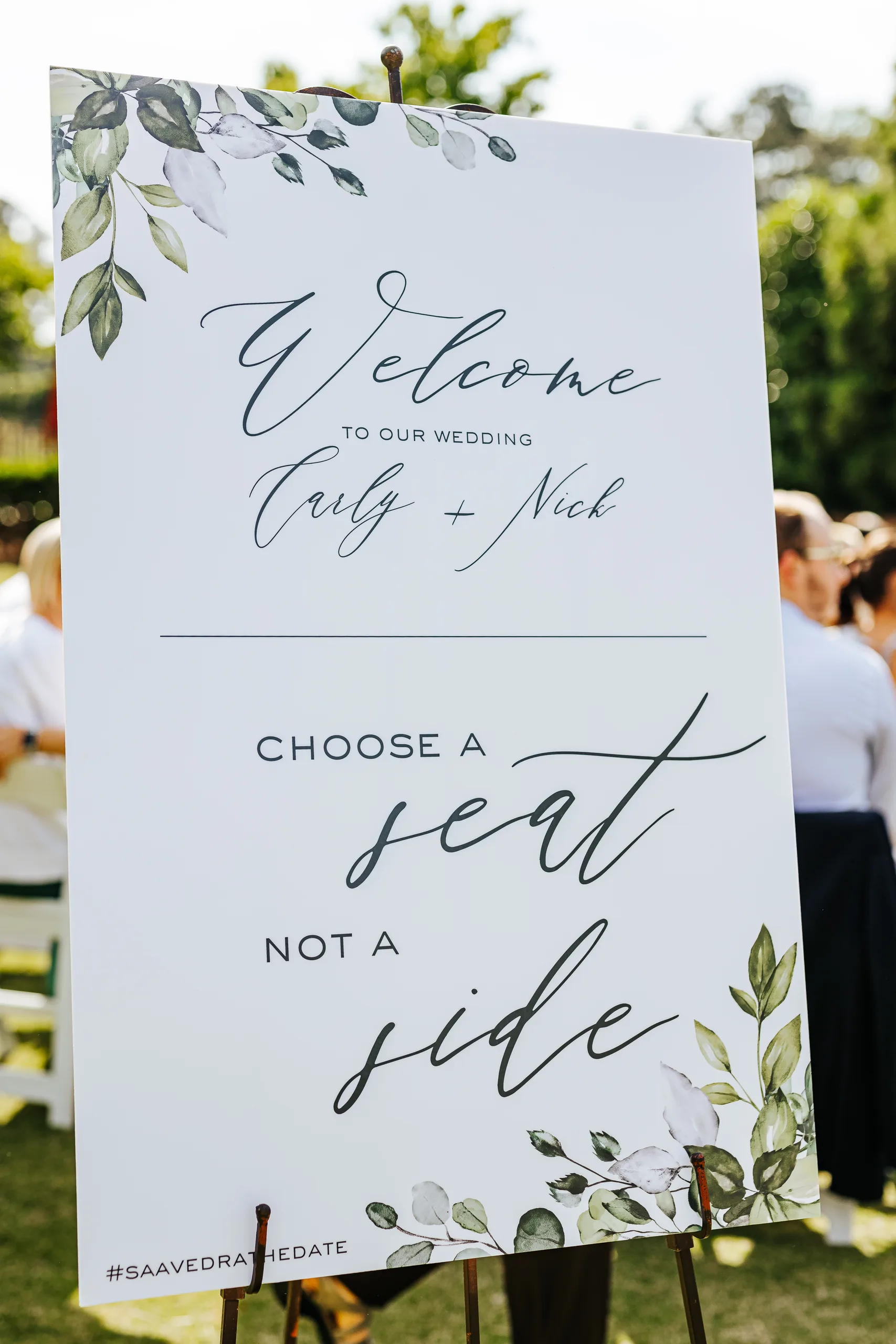 Wedding Details: the welcome sign reading choose a seat not a side at a wedding at the Country Club of Roswell in Roswell, GA