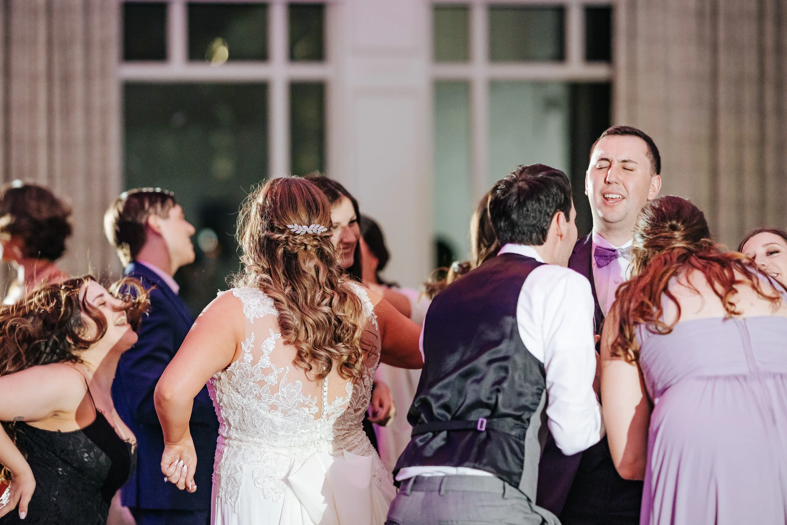 Reception: dancing with their guests at their wedding at the Country Club of Roswell in Roswell, GA