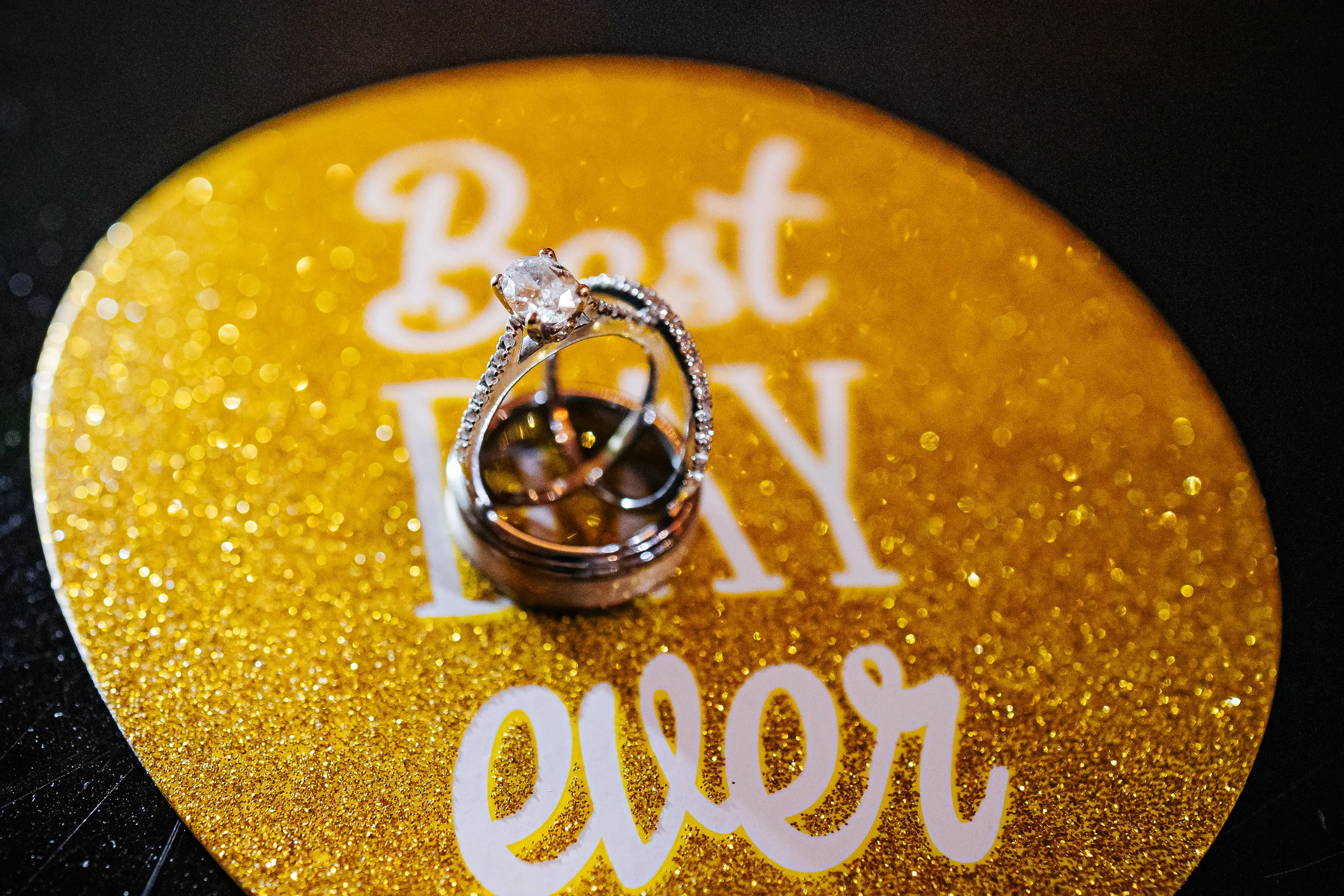 Wedding Details: their rings on a Best Day Ever coaster at a wedding at the Country Club of Roswell in Roswell, GA