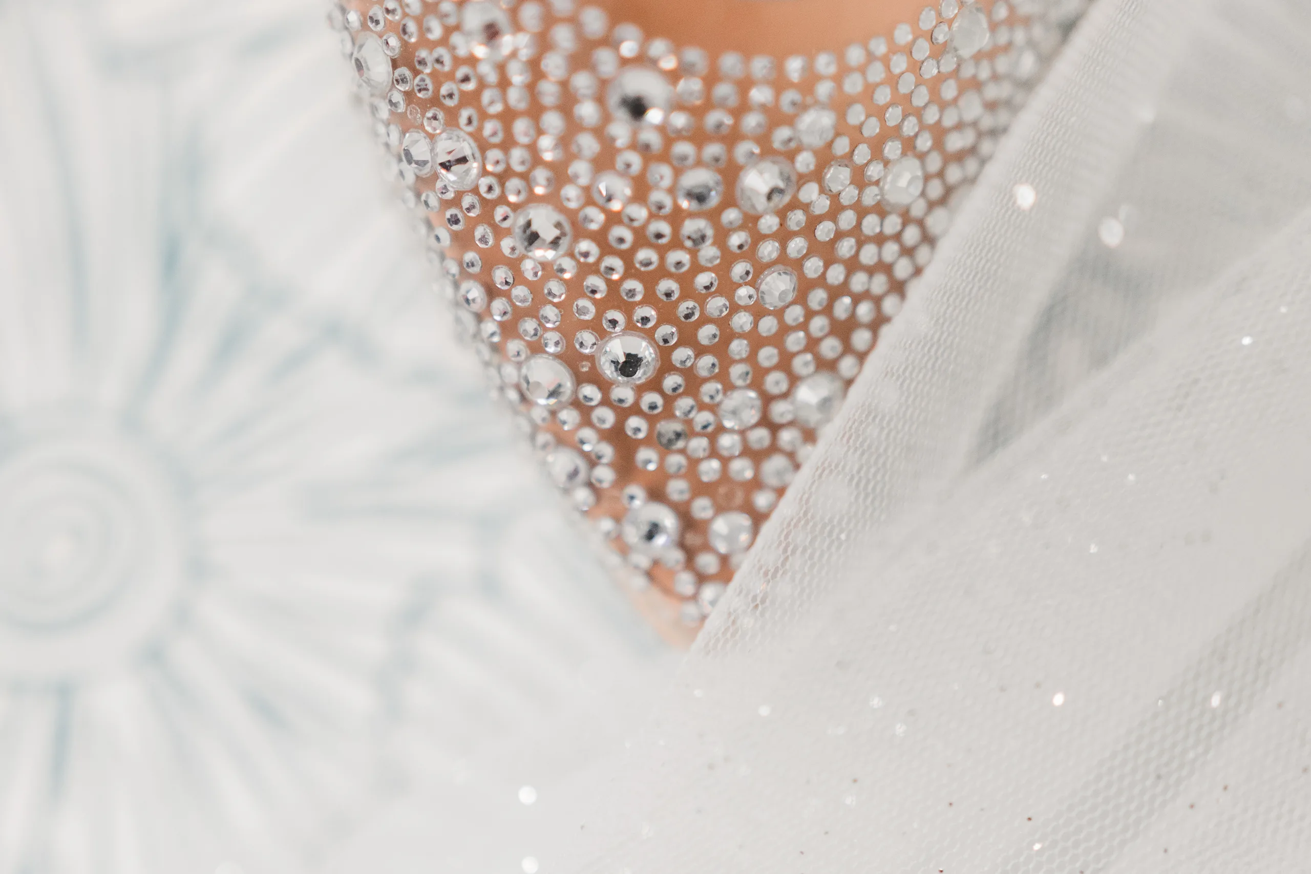 Wedding Details: the crystal beading at the neckline of her gown, at a wedding at the Historic DeKalb Courthouse in Decatur, GA