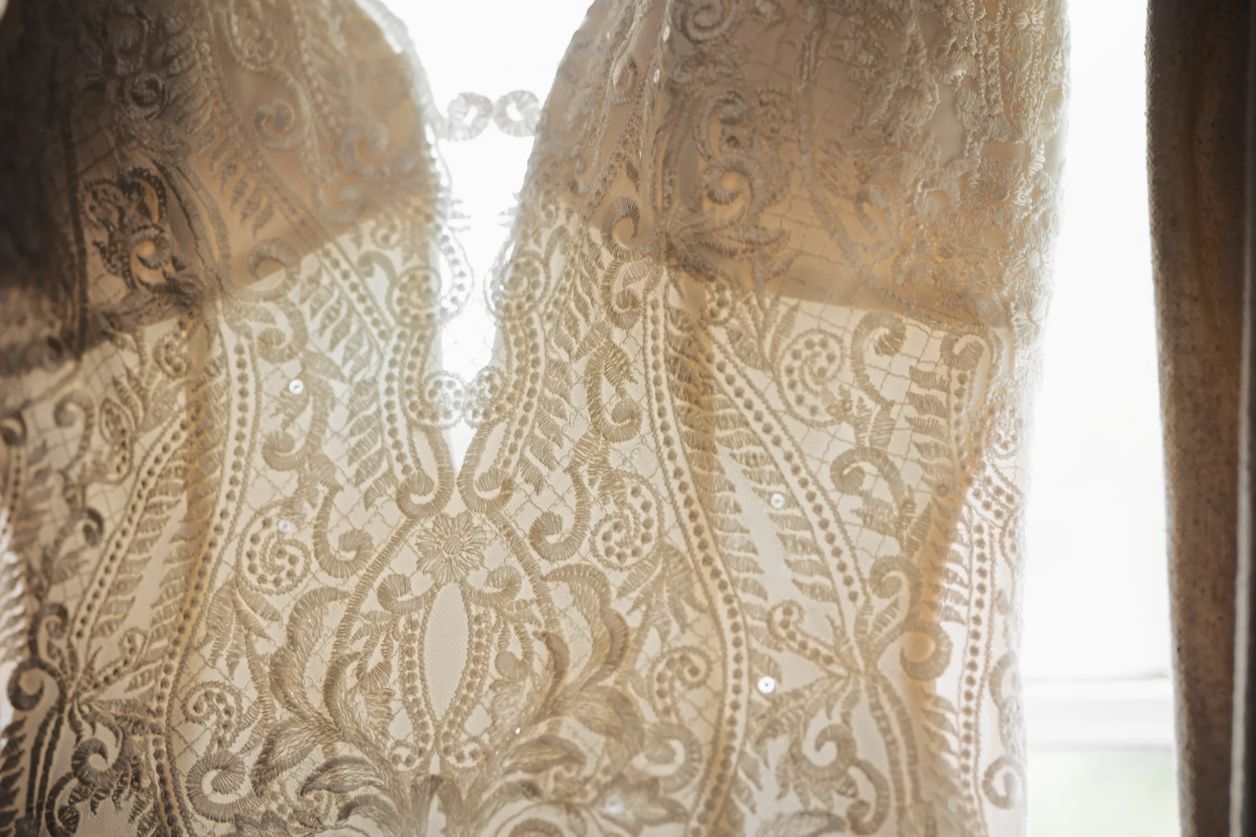 Wedding Details: the lace of her gown up close at a wedding at Ivy Hall at Roswell Mill in Roswell, GA