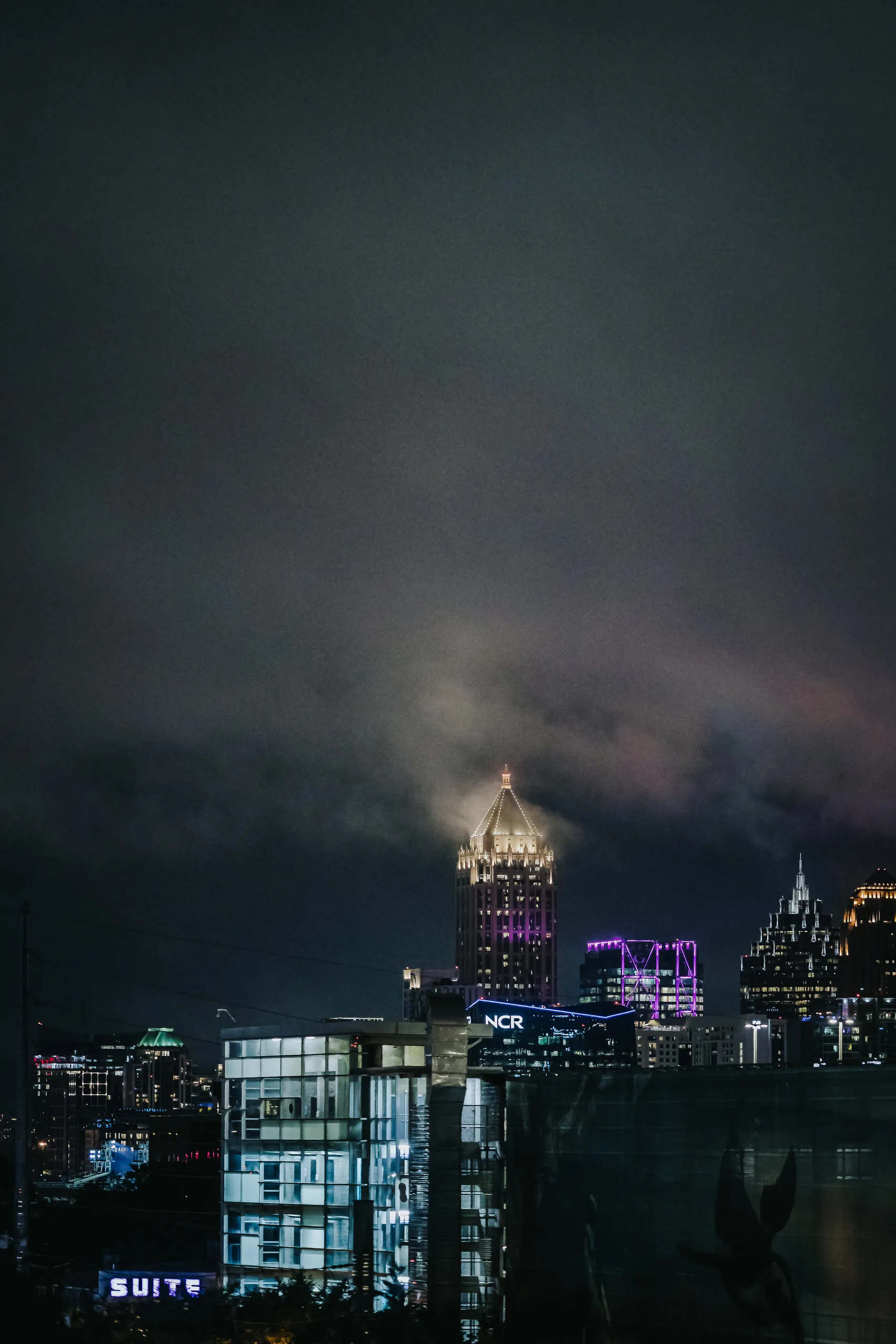 Reception Details: the Bank of America Plaza in the clouds at night, at a wedding at Terminus 330 in Atlanta, GA