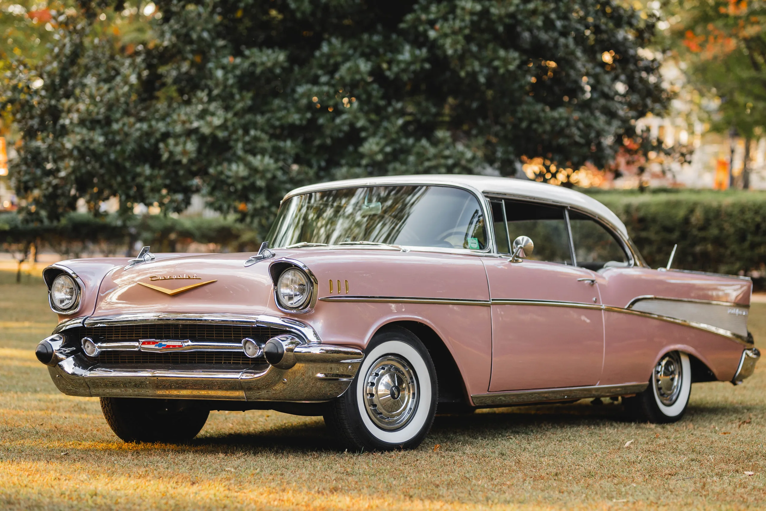 Wedding Details: the vintage pink Chevrolet parked on the lawn, at a wedding at Naylor Hall in Roswell, GA