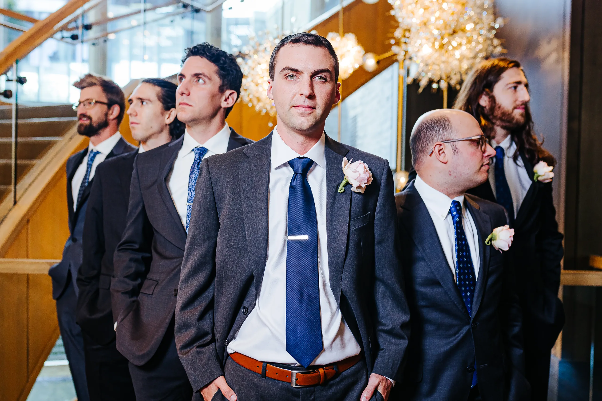 Wedding Party: the groom with his groomsmen at their wedding at the Omni Hotel at The Battery in Atlanta, GA
