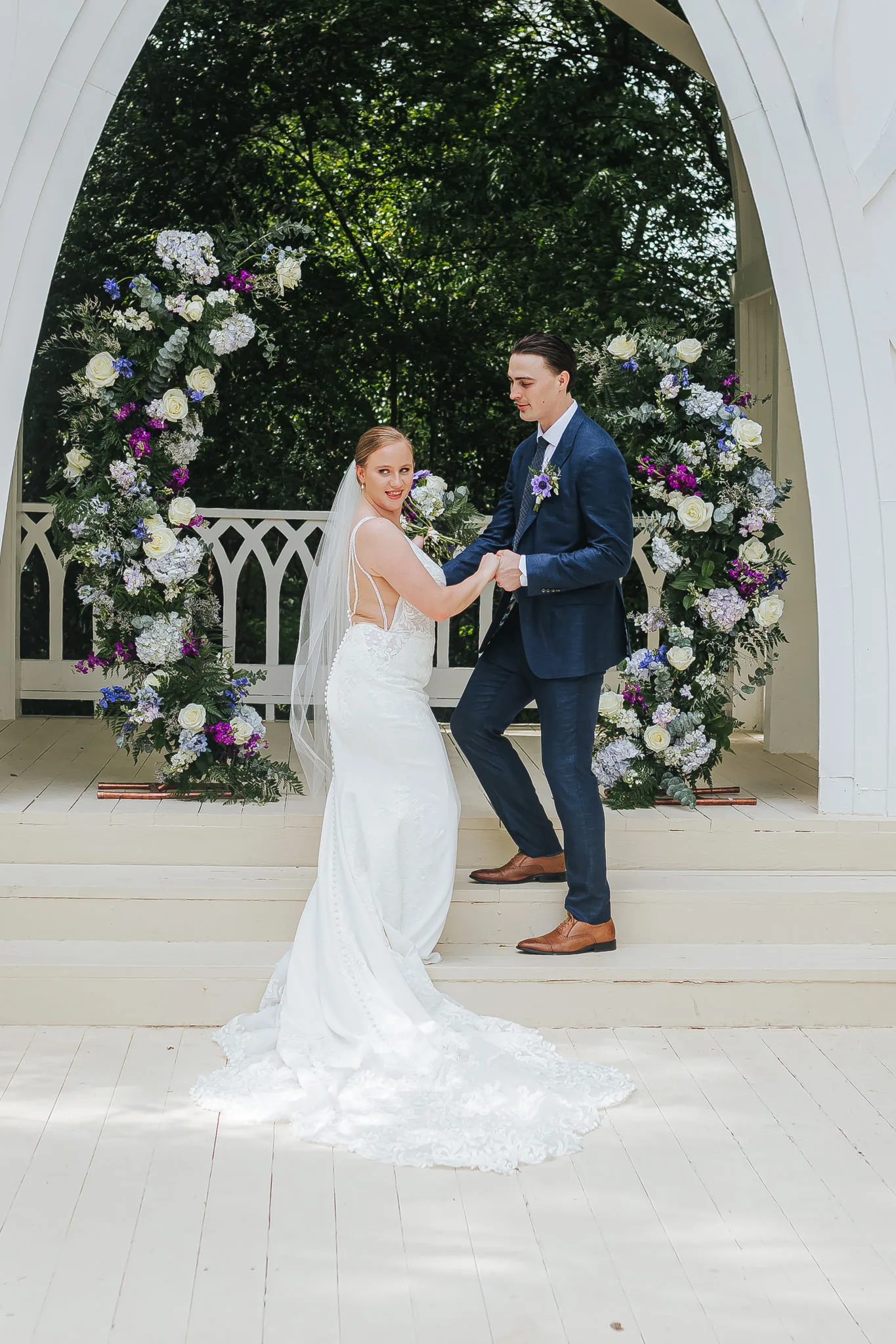 Wedding Formals: a twirl at the chapel, at their wedding at The Wildflower 301 in Greensboro, GA