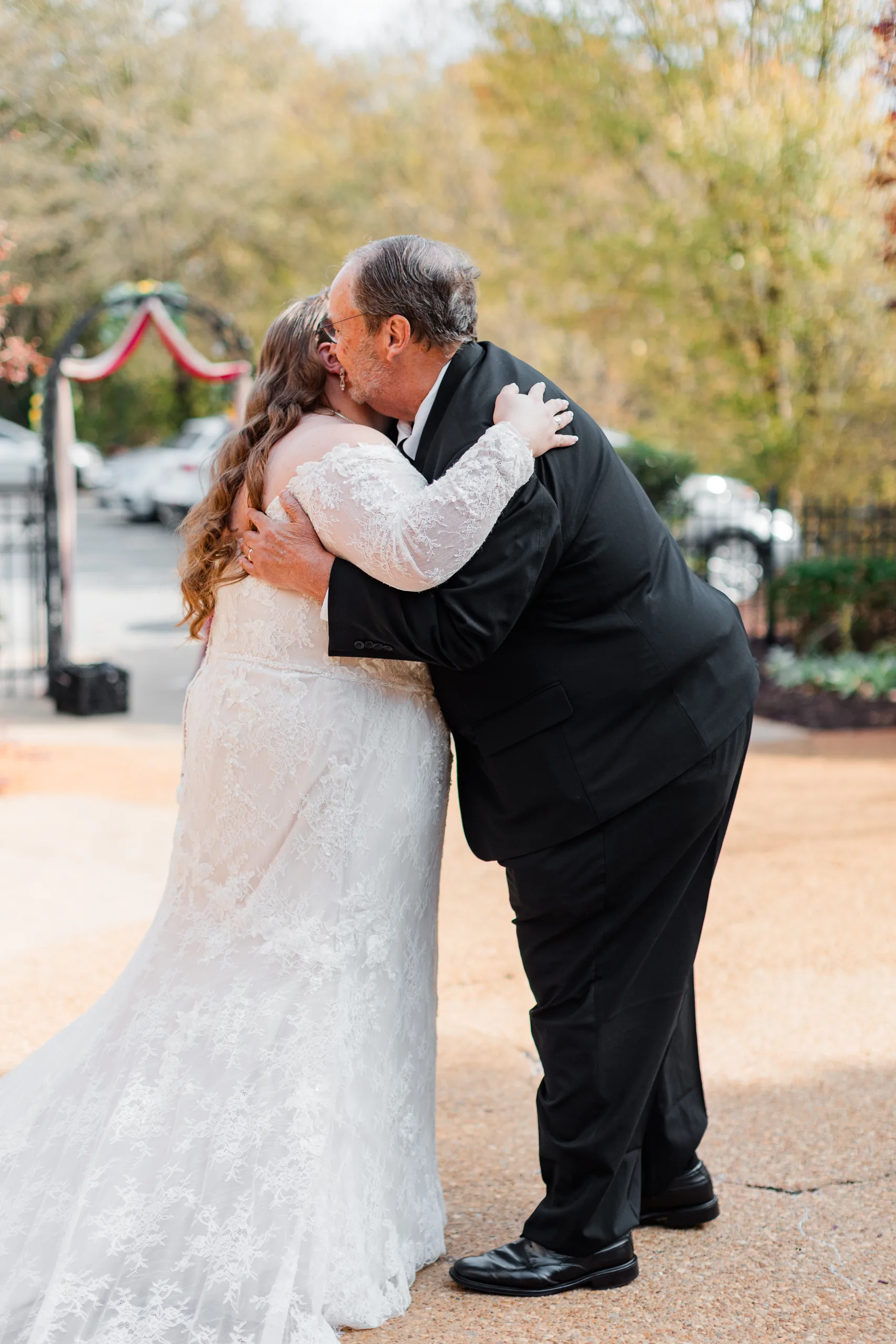 First Look: a hug with her dad, before their wedding at 550 Trackside in Lawrenceville, GA