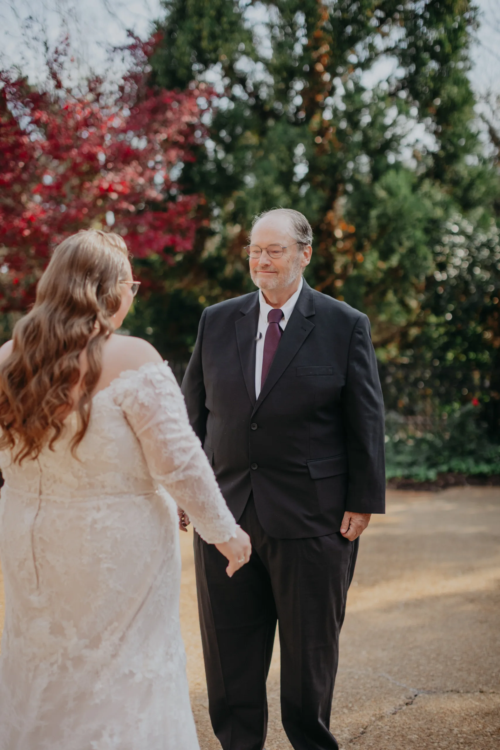 First Look: her dad seeing her for the first time, before their wedding at 550 Trackside in Lawrenceville, GA
