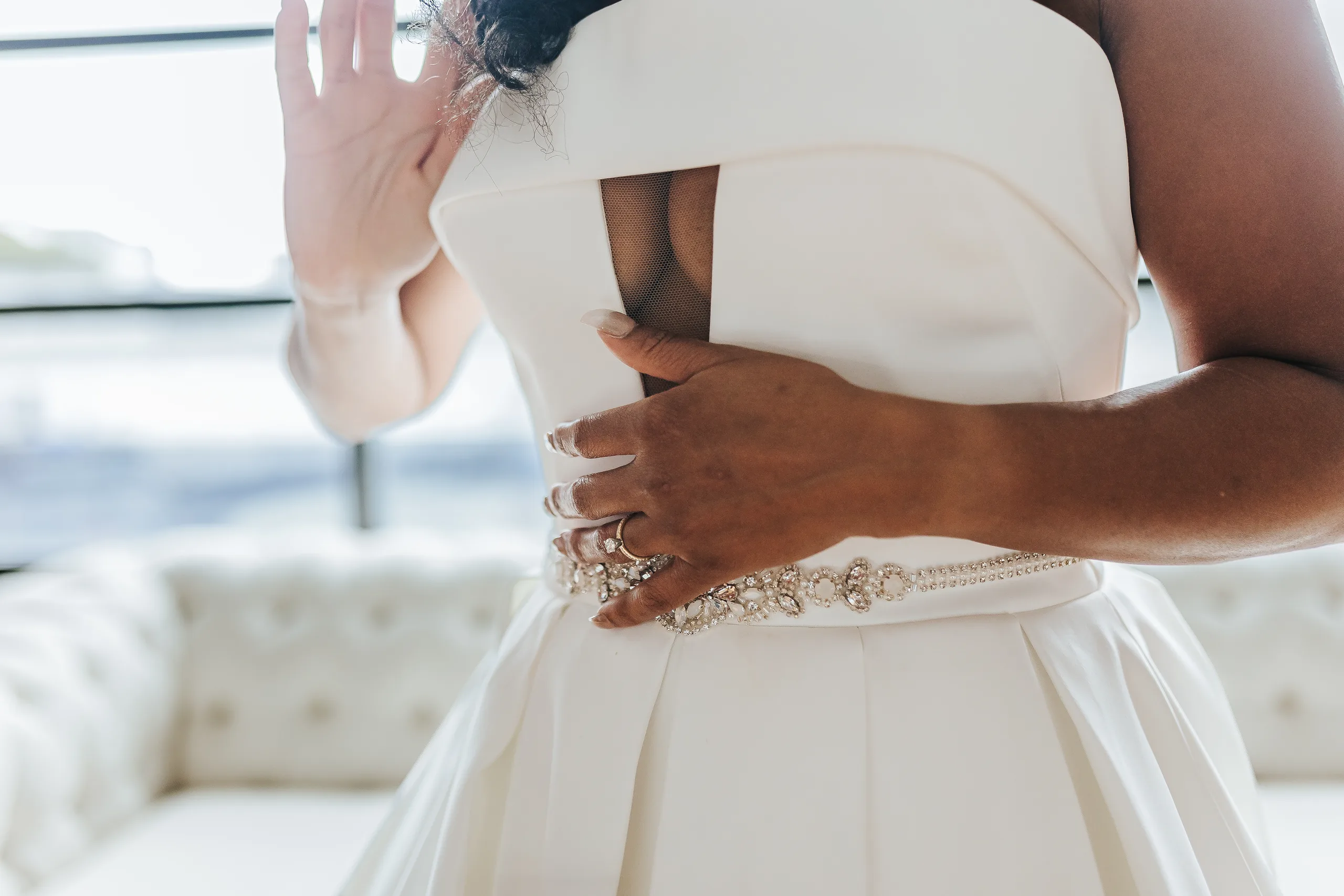 Bridal Portraits: the cutout of her gown and her beaded belt, at their wedding at Terminus 330 in Atlanta, GA