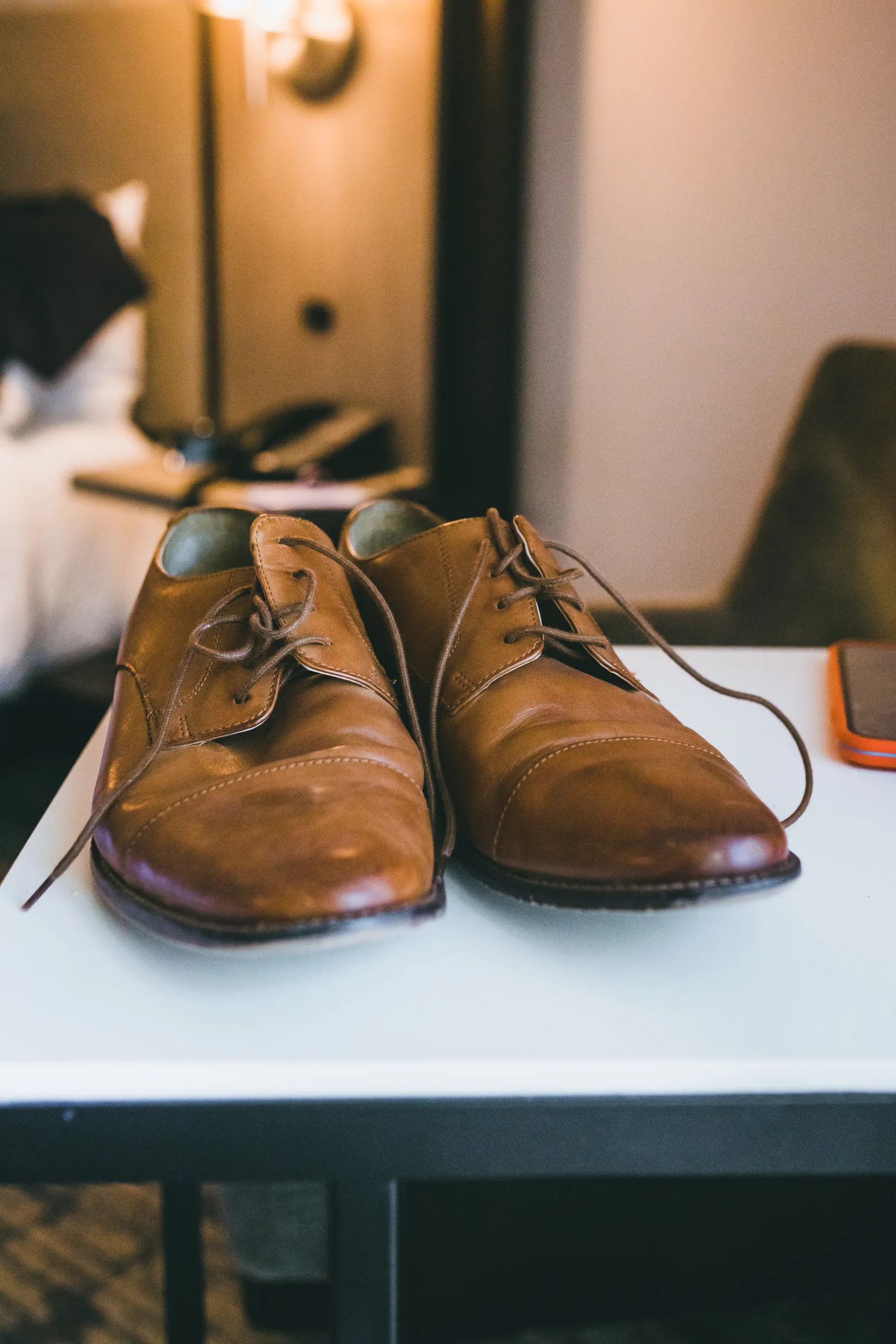 Wedding Details: his brown leather dress shoes, at a wedding at Atlanta Evergreen Lakeside Resort in Stone Mountain, GA