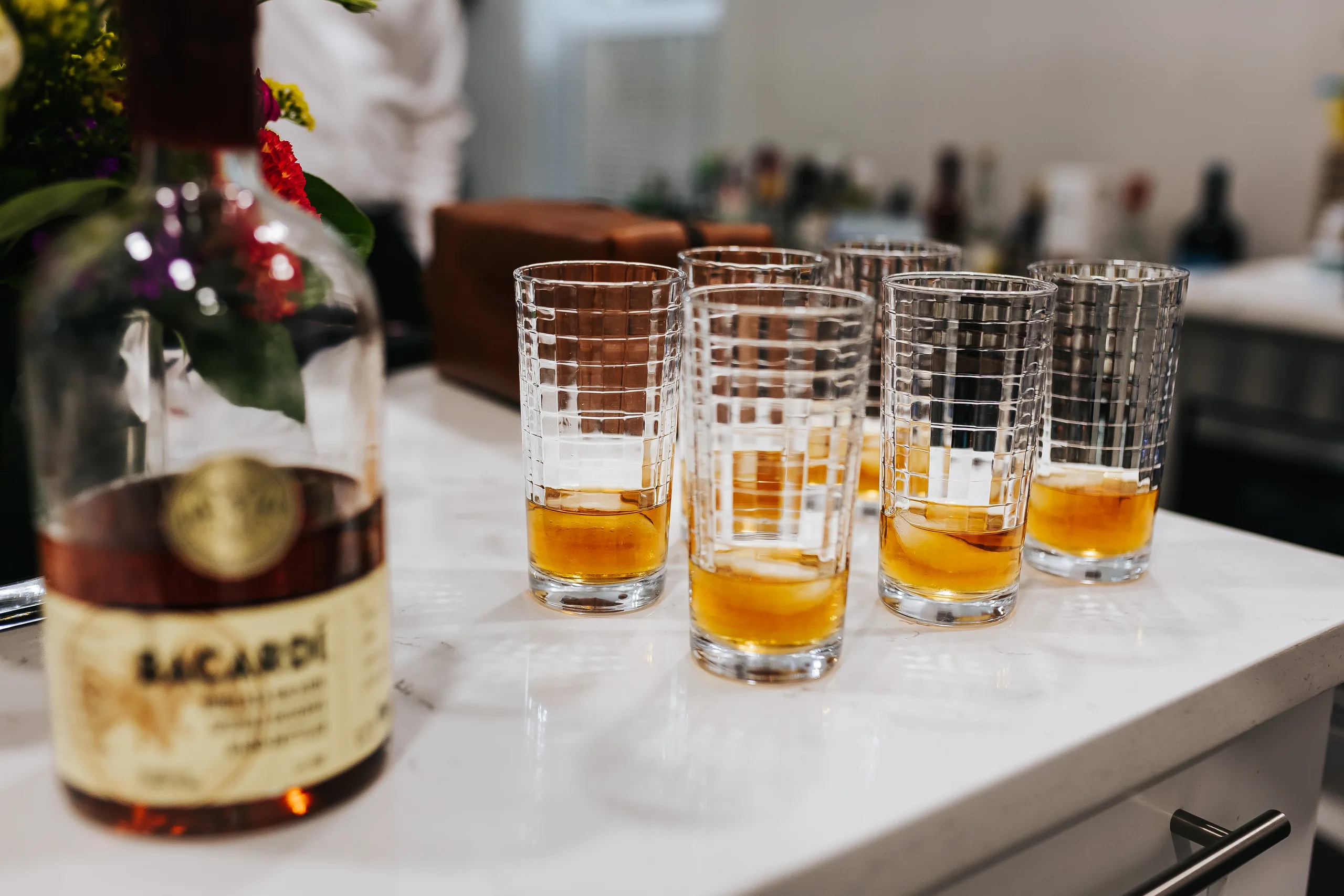 Getting Ready: glasses of rum poured for the groomsmen, before their wedding at Terminus 330 in Atlanta, GA