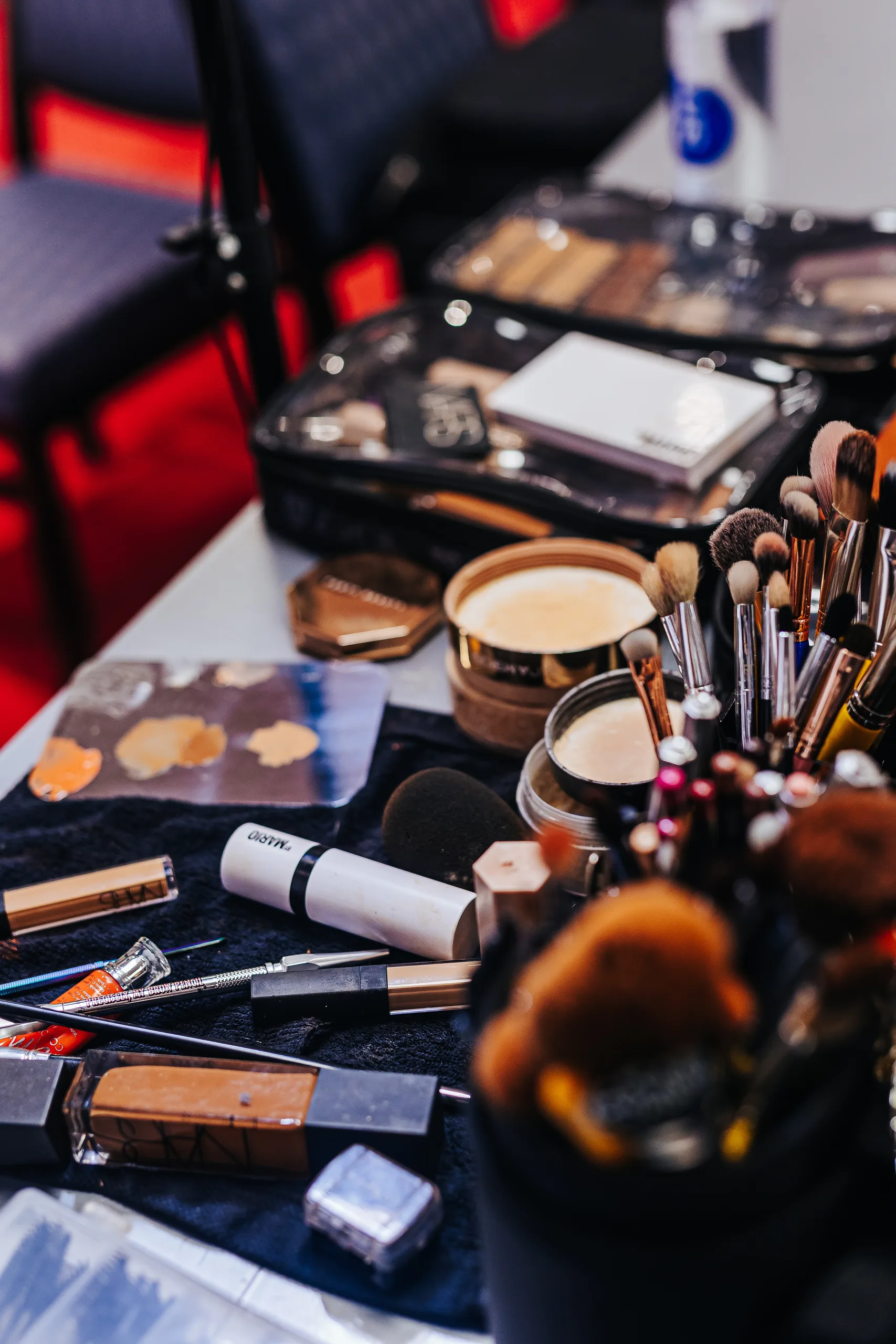 Getting Ready: a makeup artist's brushes and palettes laid out, before their wedding at Terminus 330 in Atlanta, GA