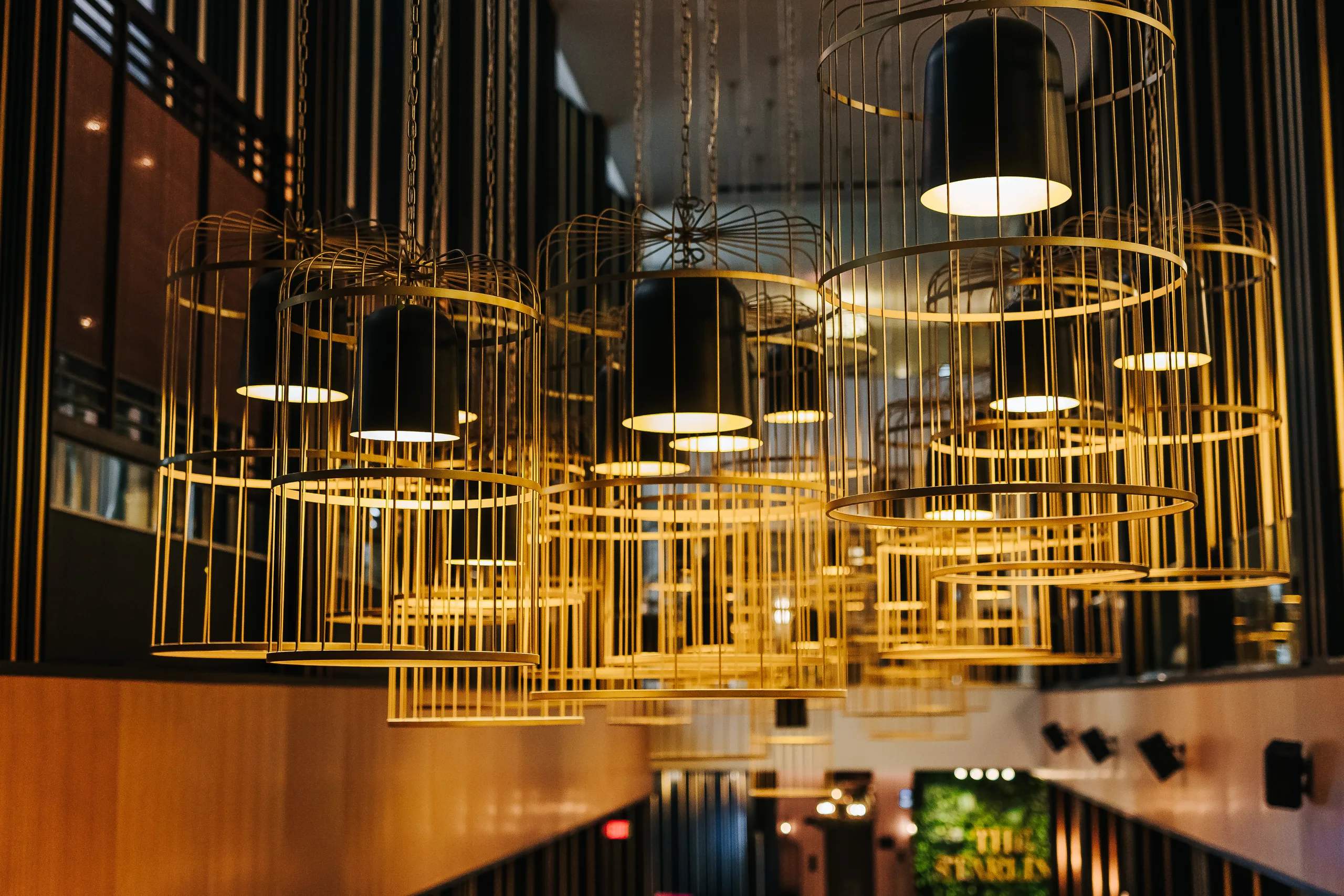 Getting Ready: gold birdcage chandeliers at The Starling hotel in Midtown, before their wedding at Terminus 330 in Atlanta, GA