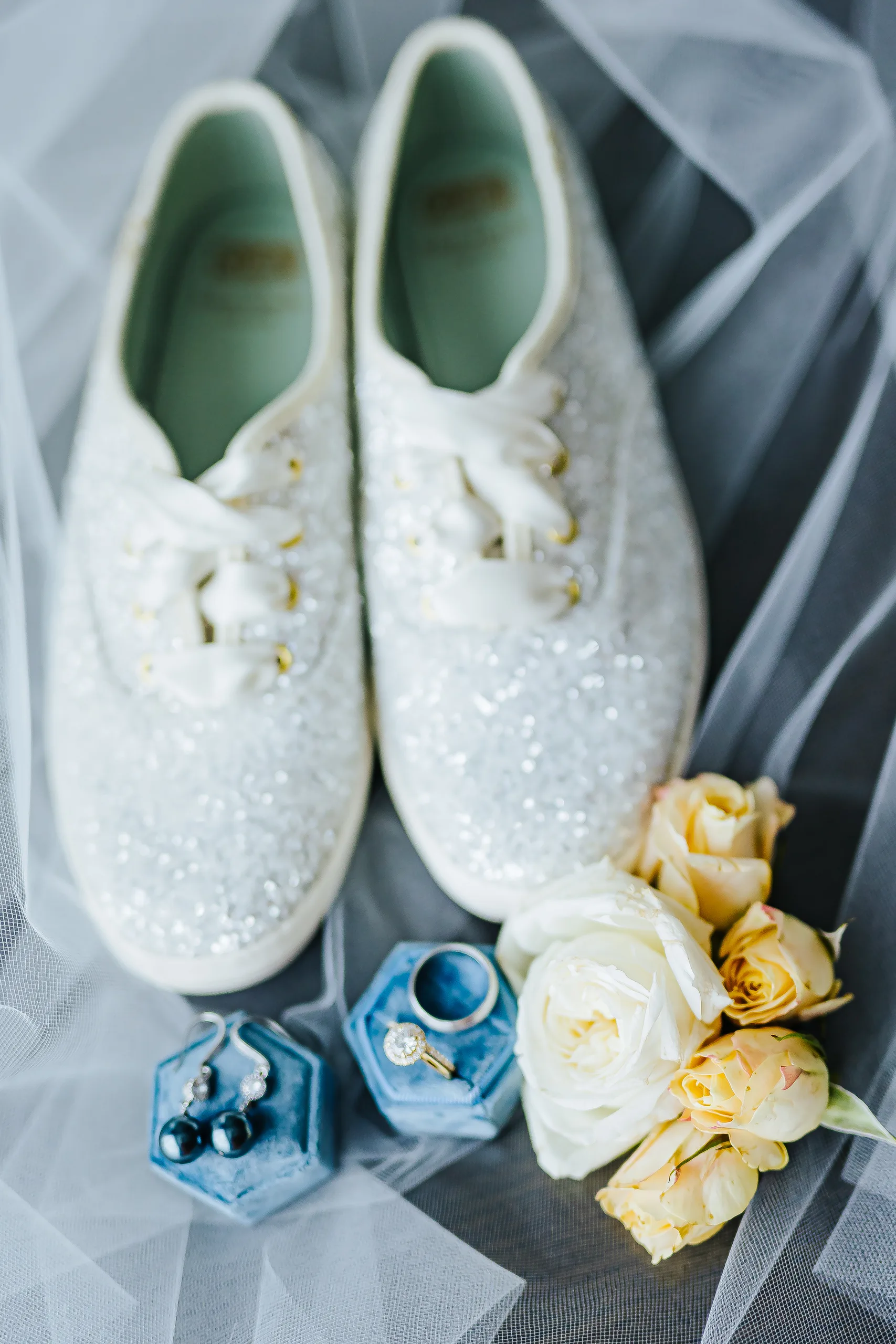 Wedding Details: her glitter Keds with the rings in blue velvet boxes at a wedding at the Omni Hotel at The Battery in Atlanta, GA