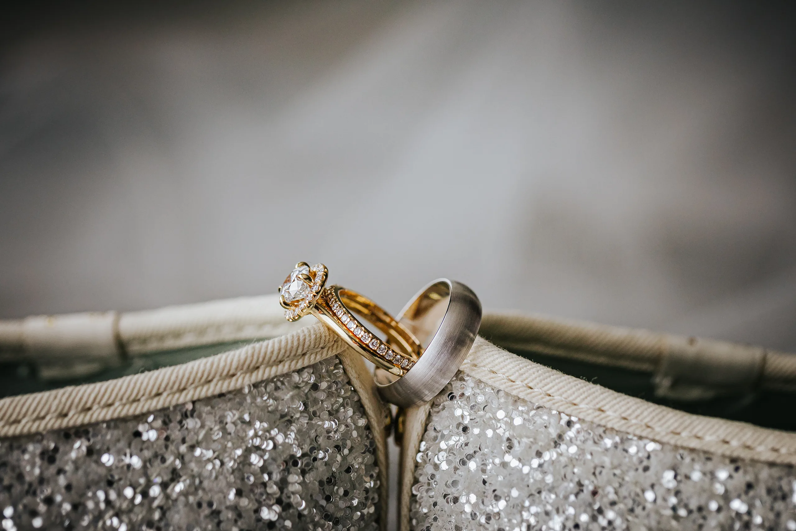 Wedding Details: their rings resting in her glitter Keds at a wedding at the Omni Hotel at The Battery in Atlanta, GA