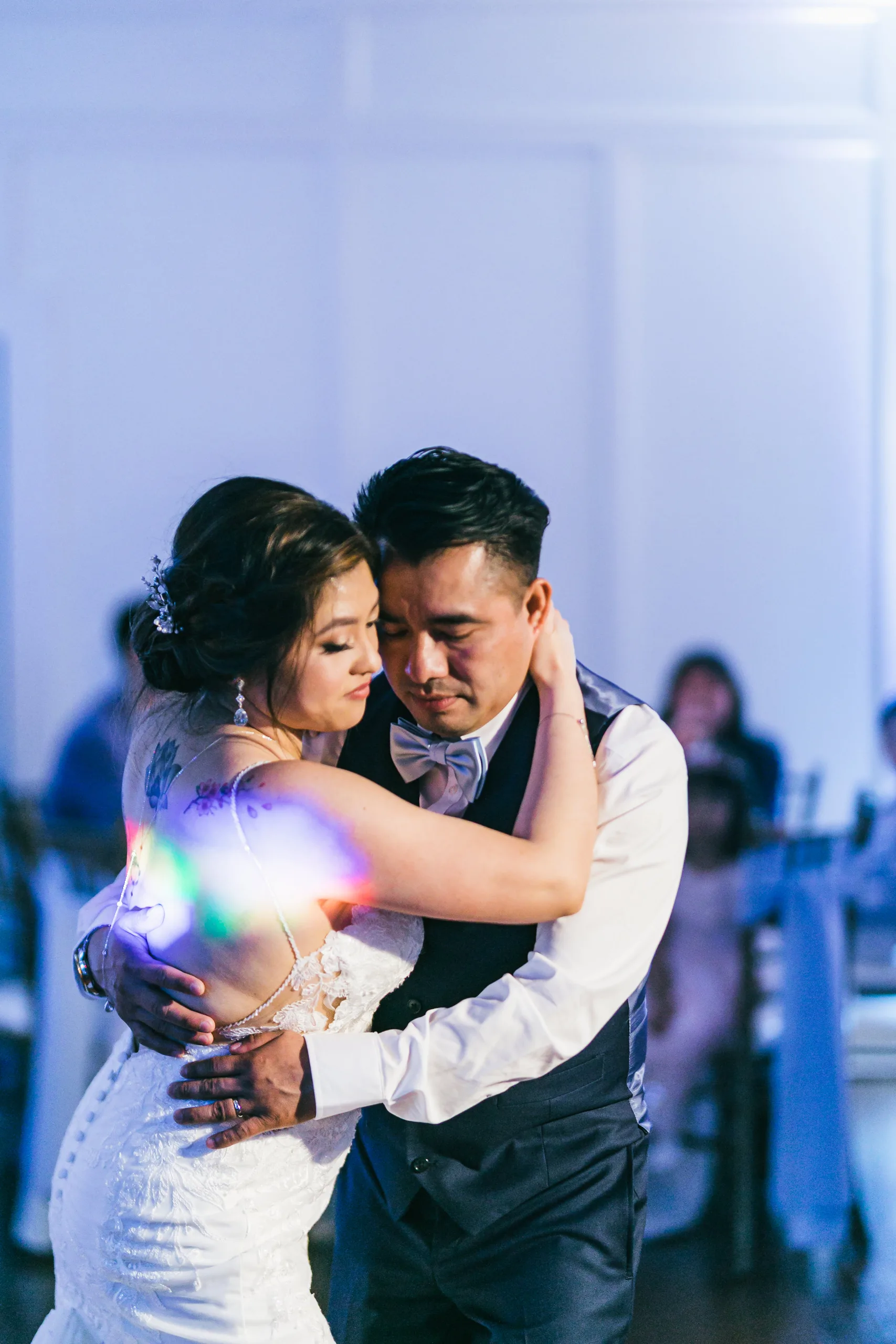 Reception: the groom dancing with the bride at their wedding at the Payne-Corley House in Duluth, GA