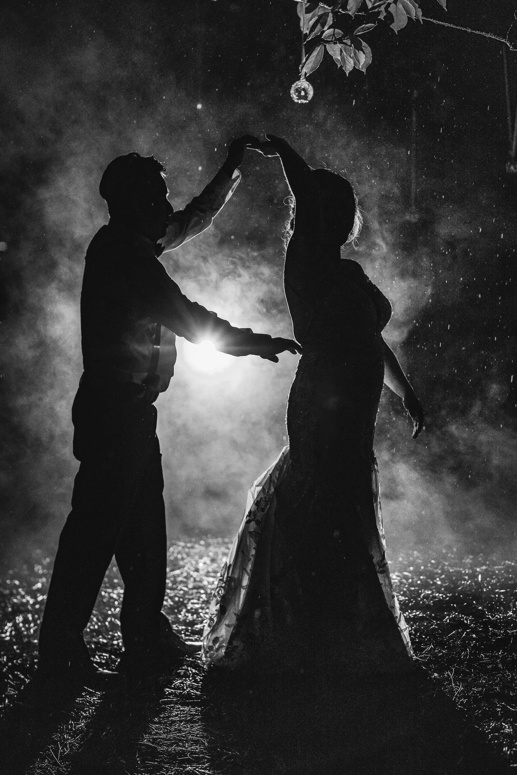 Night Portraits: a twirl in the fog, in black and white at their wedding at the Payne-Corley House in Duluth, GA