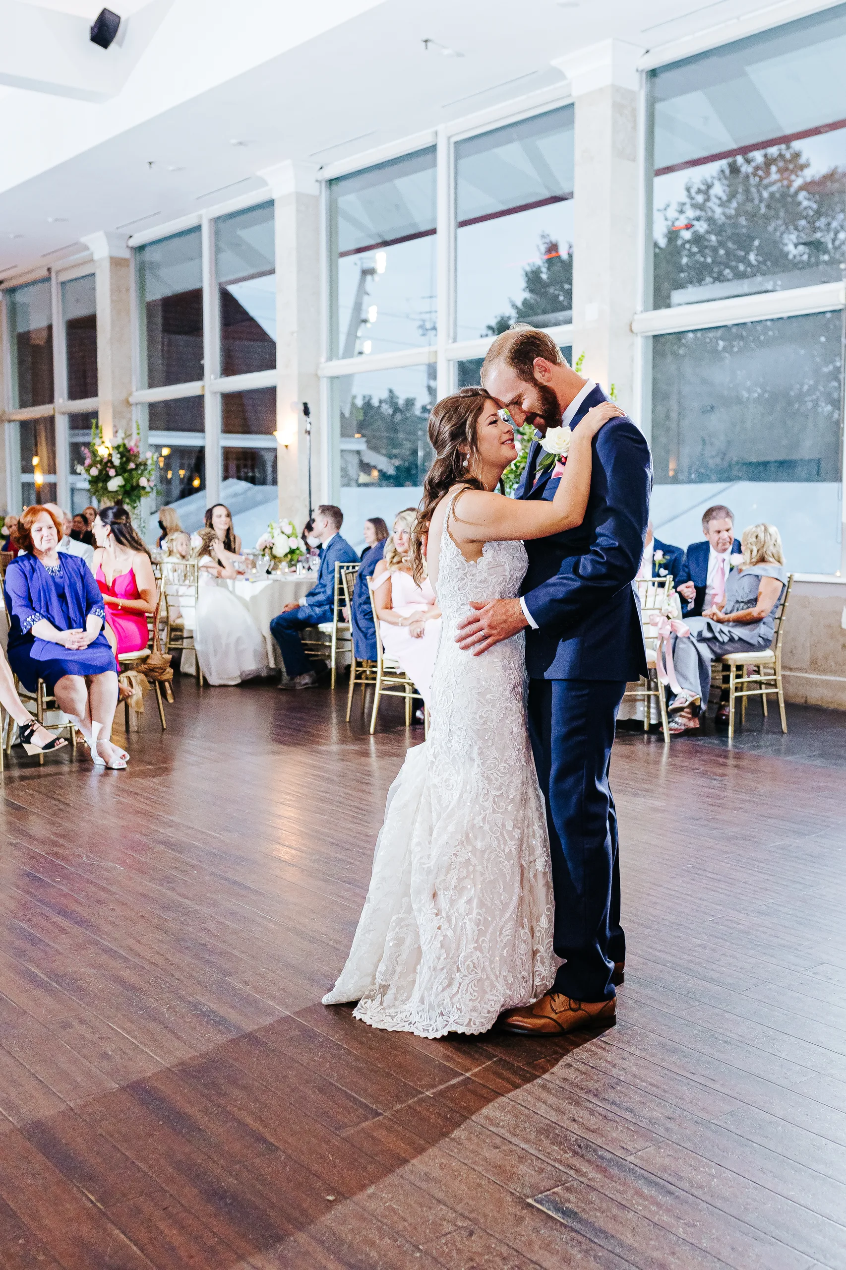 First Dance: their first dance by the tall windows, at their wedding at The Piedmont Room in Atlanta, GA