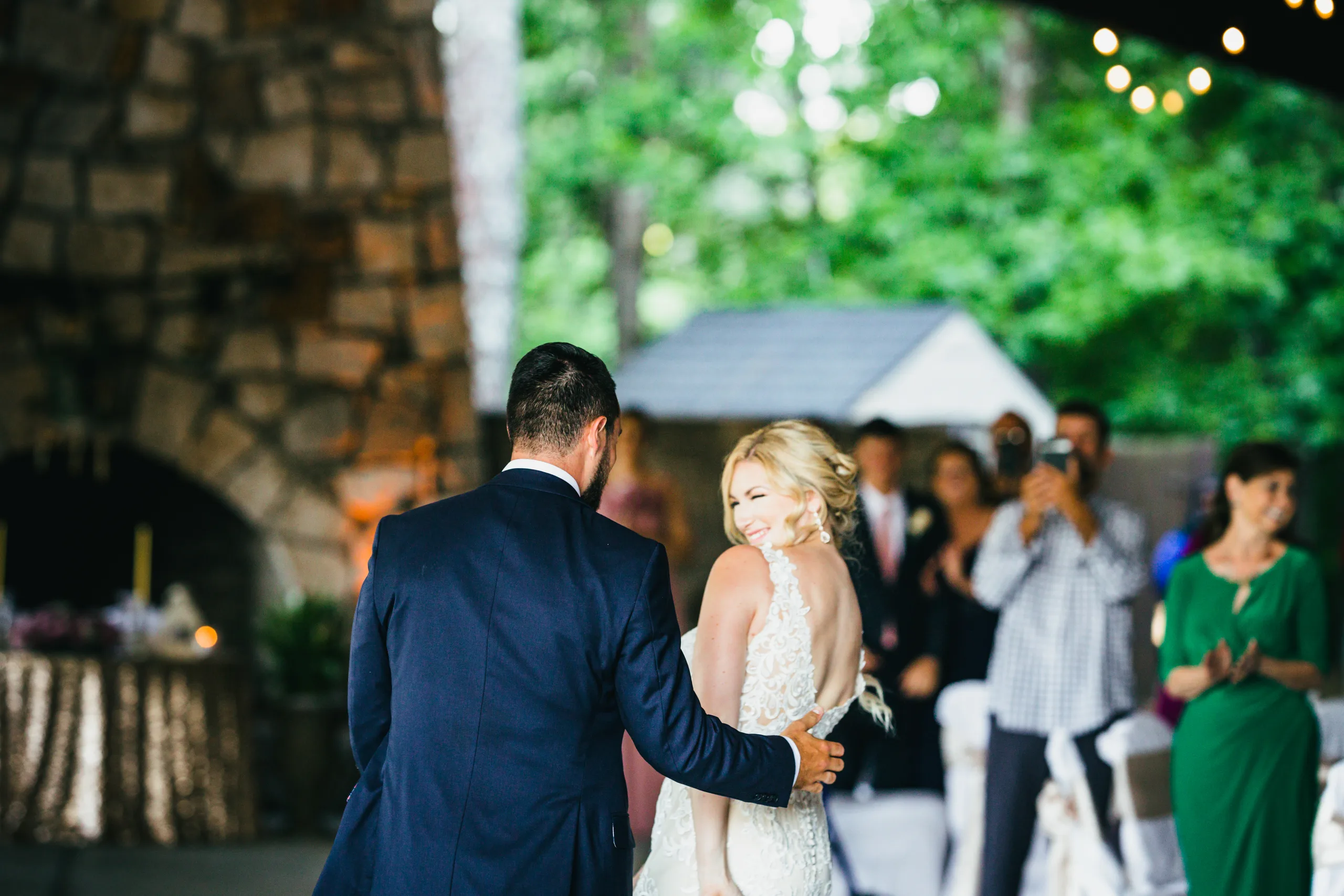 First Dance: walking out to the dance floor, at their wedding at Atlanta Evergreen Lakeside Resort in Stone Mountain, GA