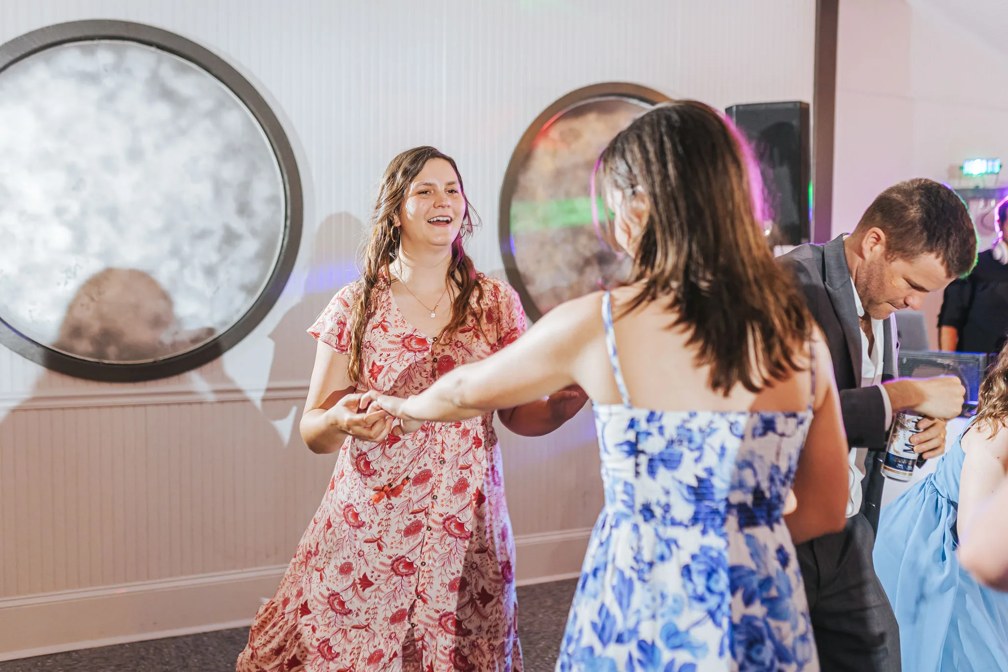 Reception: guests dancing, at their wedding at The Wildflower 301 in Greensboro, GA