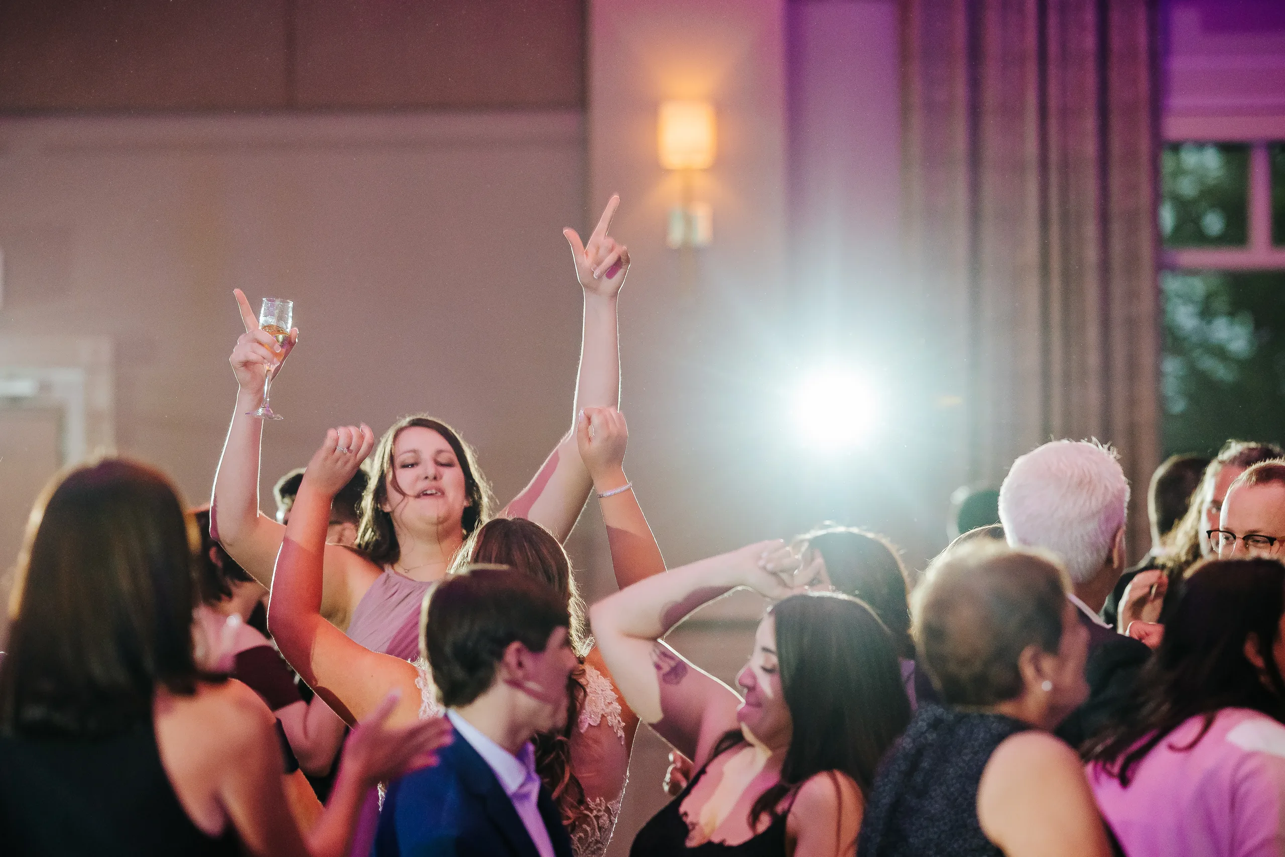 Reception: guests dancing at their wedding at the Country Club of Roswell in Roswell, GA