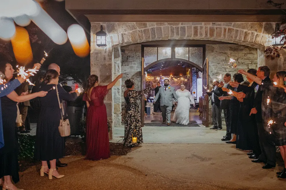 Send-Off: a moving clip of them running out through the sparklers, at their wedding at 550 Trackside in Lawrenceville, GA